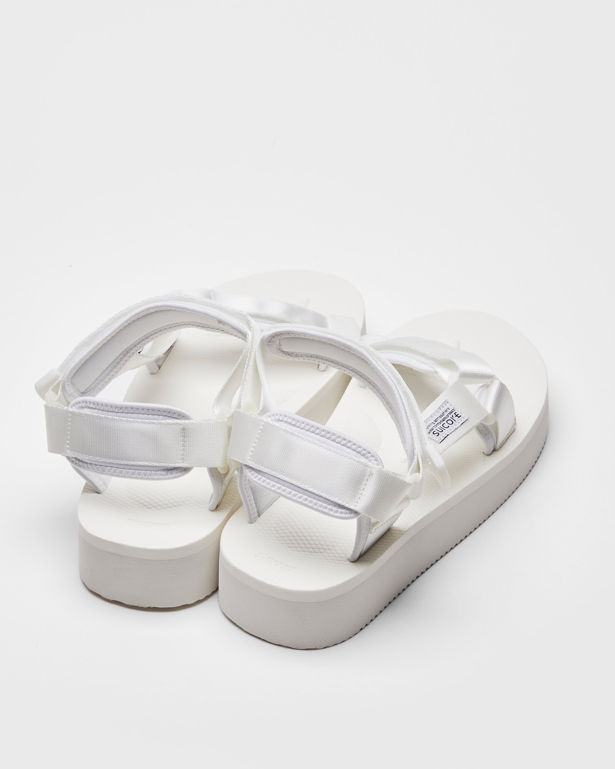 SUICOKE DEPA-2PO sandals with white nylon upper, white midsole and sole, strap and logo patch. From Spring/Summer 2023 collection on SUICOKE Official US & Canada Webstore. OG-022-2PO WHITE