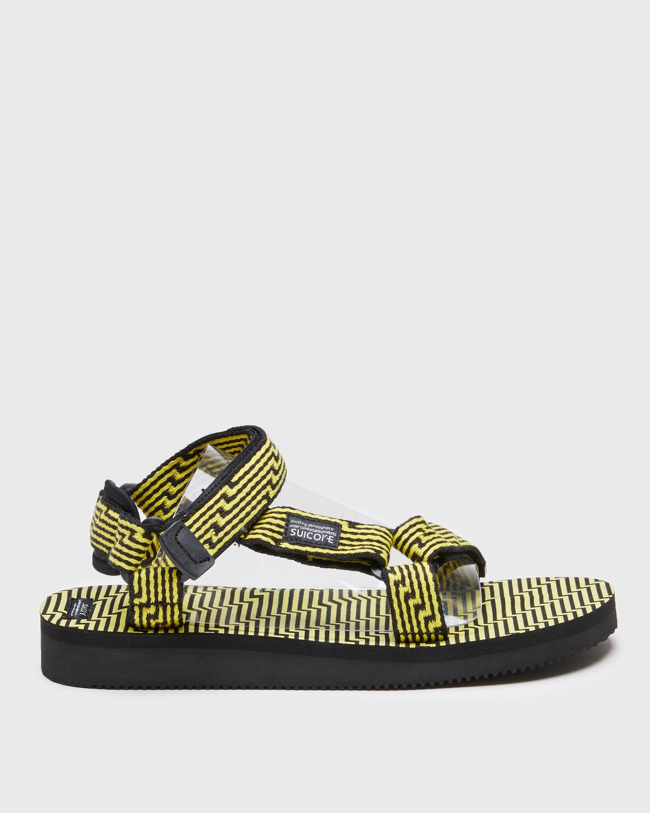 SUICOKE DEPA-JC01 sandals with black & yellow nylon upper, black & yellow midsole and sole, strap and logo patch. From Spring/Summer 2023 collection on SUICOKE Official US & Canada Webstore. OG-022-JC01 BLACK X YELLOW