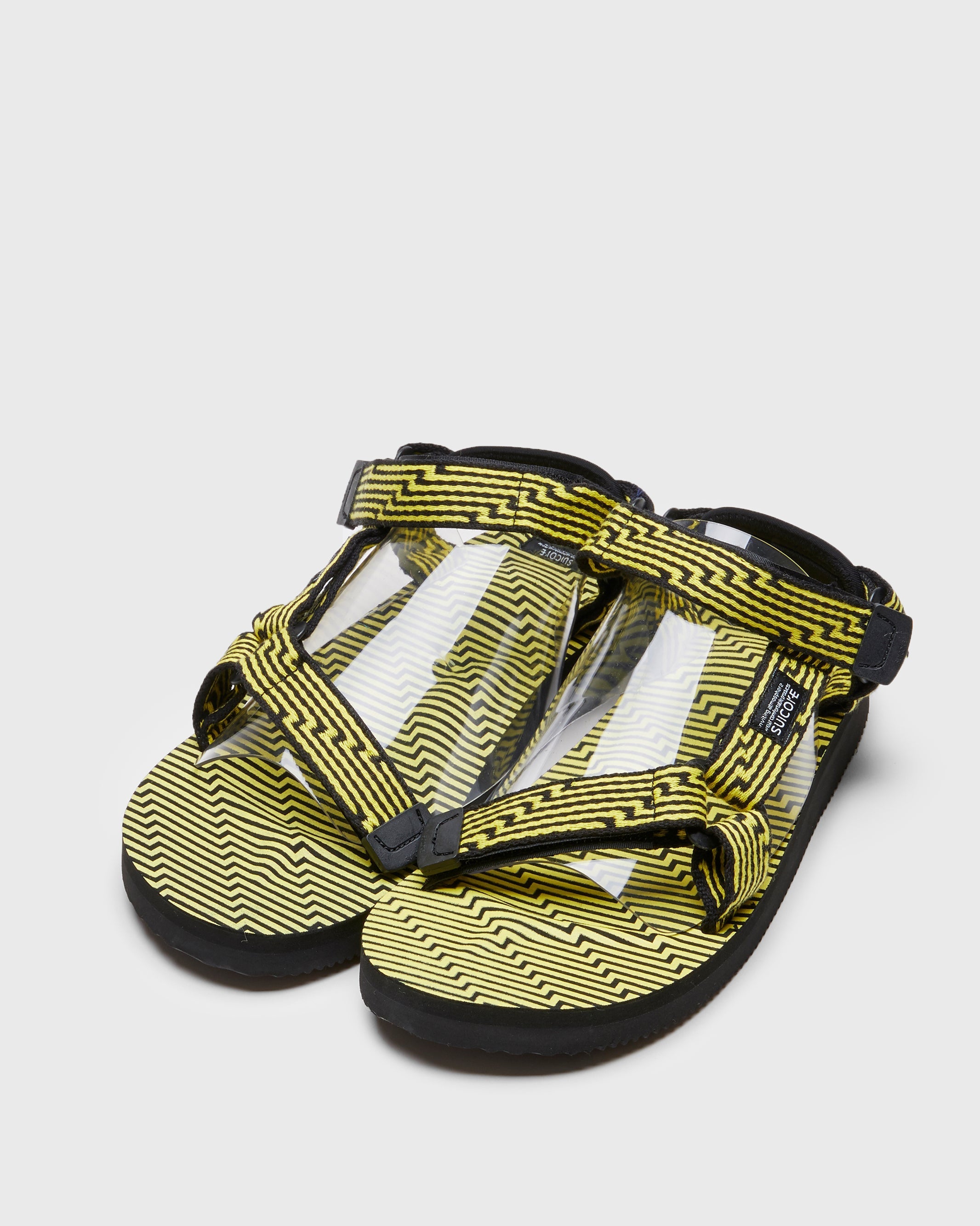 SUICOKE DEPA-JC01 sandals with black & yellow nylon upper, black & yellow midsole and sole, strap and logo patch. From Spring/Summer 2023 collection on SUICOKE Official US & Canada Webstore. OG-022-JC01 BLACK X YELLOW