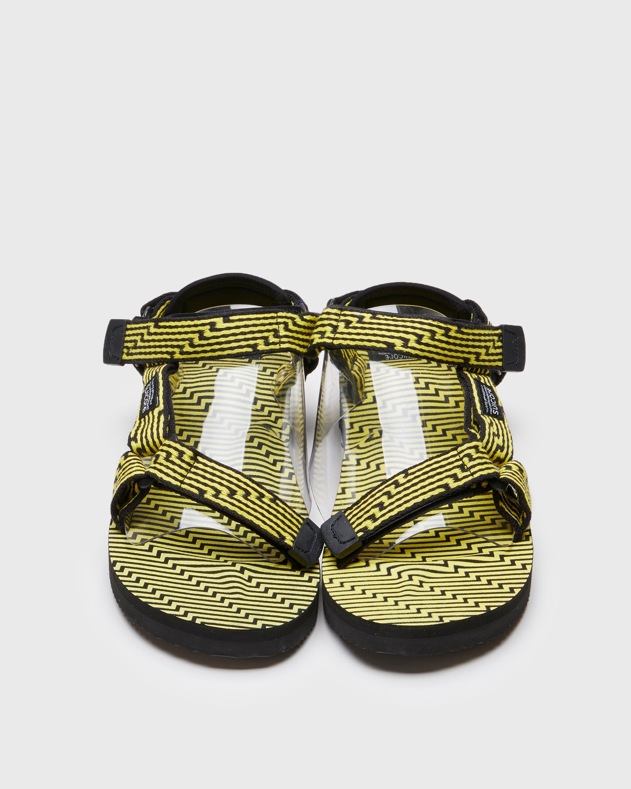 SUICOKE DEPA-JC01 sandals with black & yellow nylon upper, black & yellow midsole and sole, strap and logo patch. From Spring/Summer 2023 collection on SUICOKE Official US & Canada Webstore. OG-022-JC01 BLACK X YELLOW