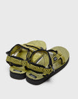 SUICOKE DEPA-JC01 sandals with black & yellow nylon upper, black & yellow midsole and sole, strap and logo patch. From Spring/Summer 2023 collection on SUICOKE Official US & Canada Webstore. OG-022-JC01 BLACK X YELLOW