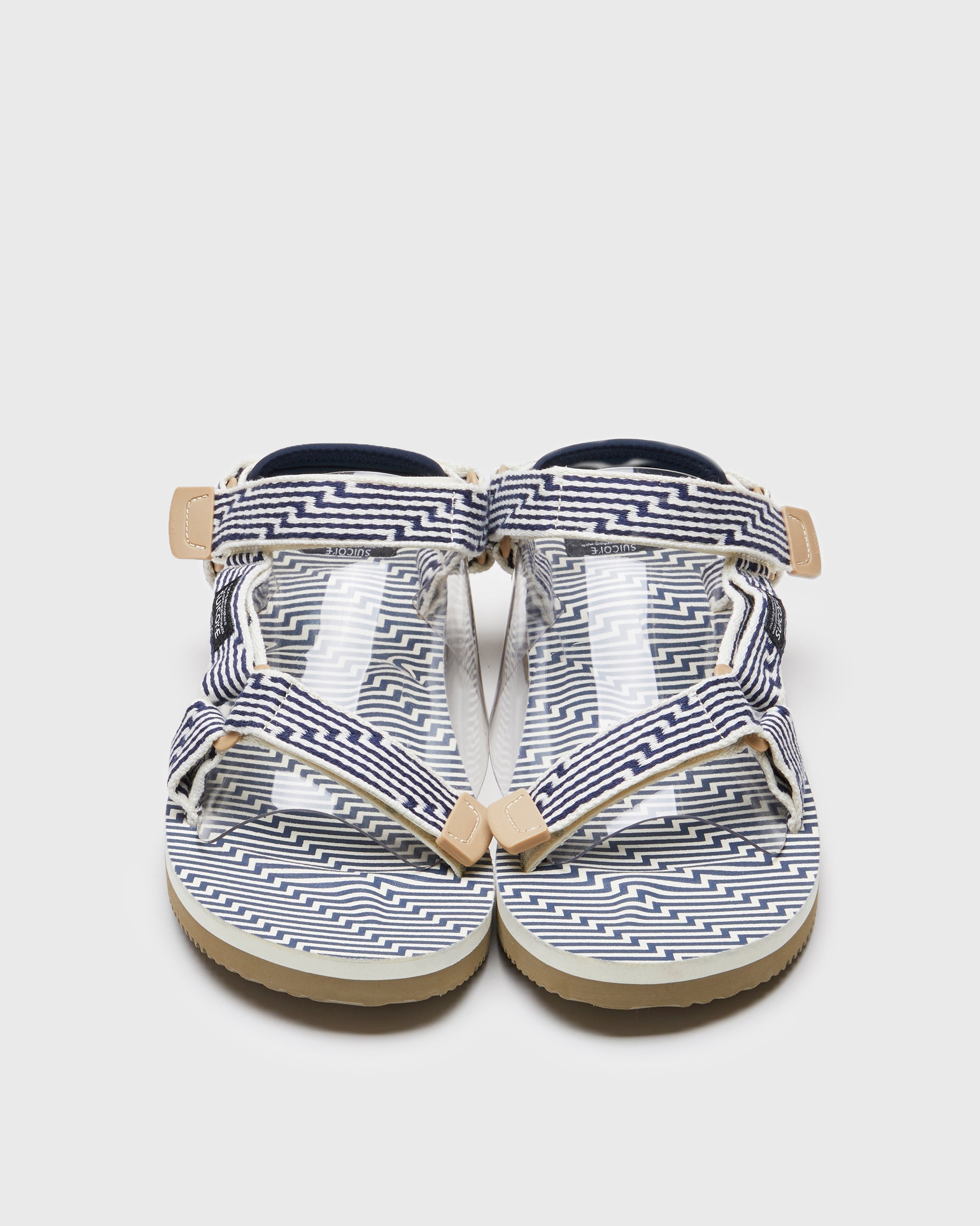 SUICOKE DEPA-JC01 sandals with ivory & navy nylon upper, ivory & navy midsole and sole, strap and logo patch. From Spring/Summer 2023 collection on SUICOKE Official US & Canada Webstore. OG-022-JC01 IVORY X NAVY