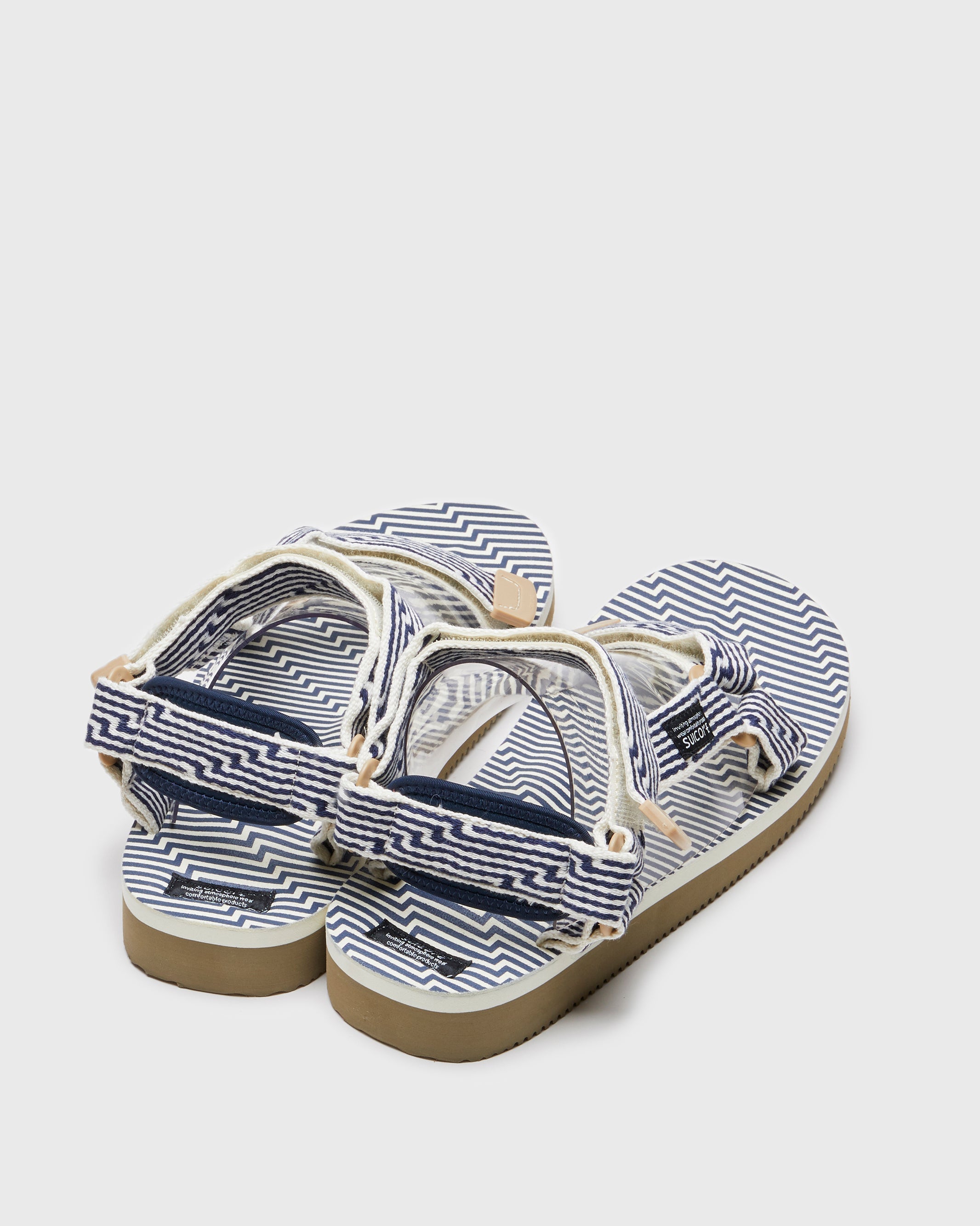 SUICOKE DEPA-JC01 sandals with ivory & navy nylon upper, ivory & navy midsole and sole, strap and logo patch. From Spring/Summer 2023 collection on SUICOKE Official US & Canada Webstore. OG-022-JC01 IVORY X NAVY