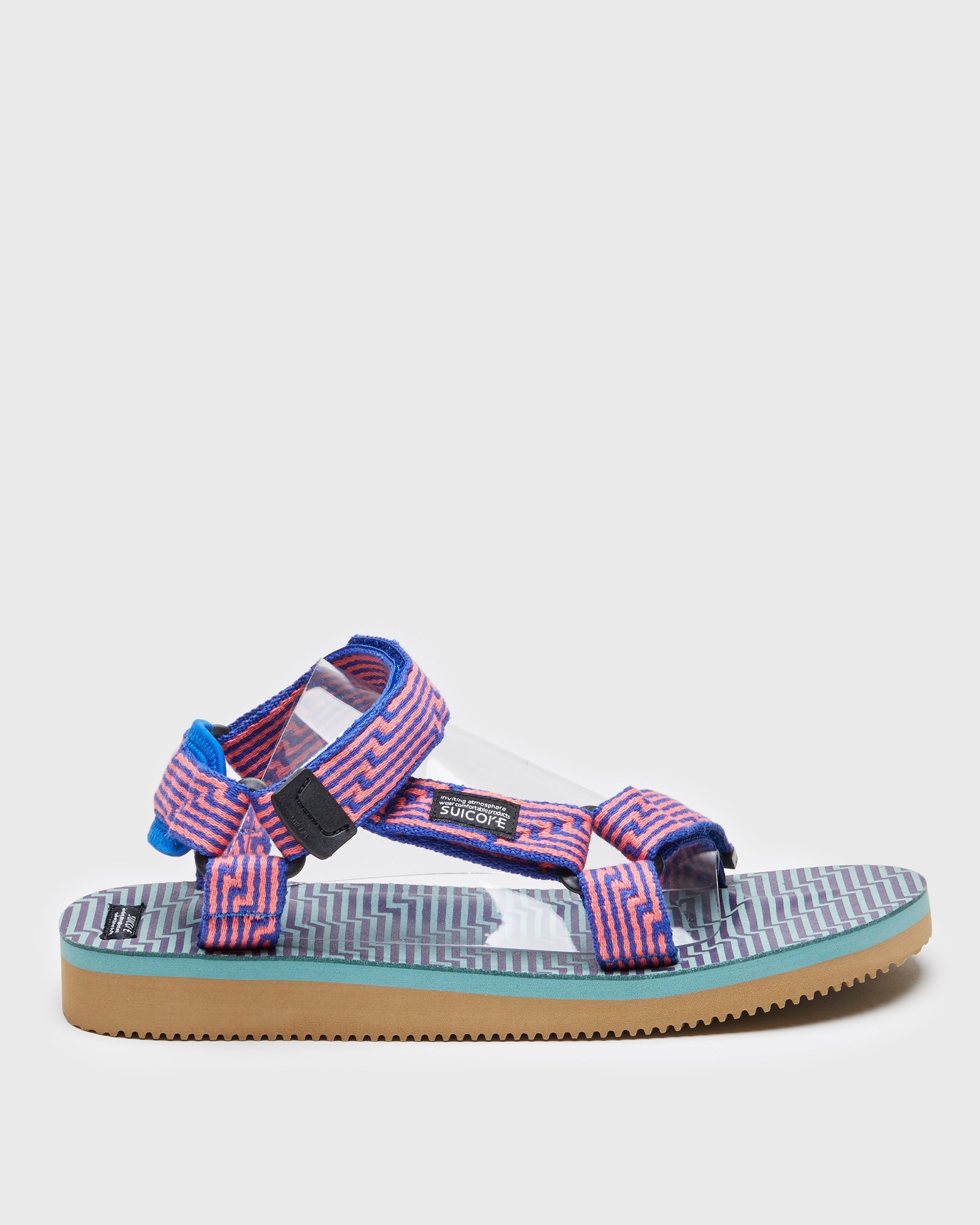 SUICOKE DEPA-JC01 sandals with orange & blue nylon upper, orange & blue midsole and sole, strap and logo patch. From Spring/Summer 2023 collection on SUICOKE Official US & Canada Webstore. OG-022-JC01 ORANGE X BLUE