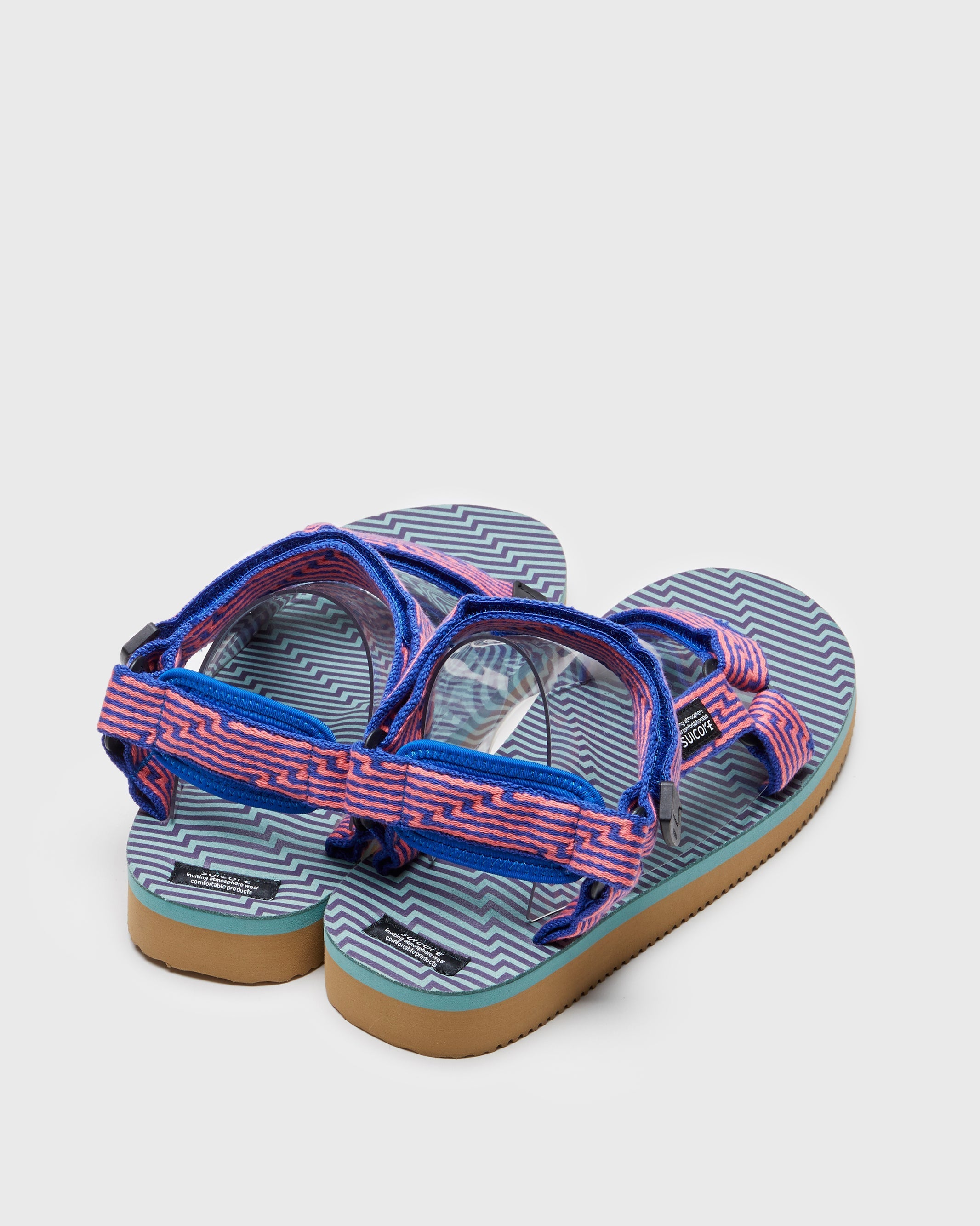 SUICOKE DEPA-JC01 sandals with orange & blue nylon upper, orange & blue midsole and sole, strap and logo patch. From Spring/Summer 2023 collection on SUICOKE Official US & Canada Webstore. OG-022-JC01 ORANGE X BLUE