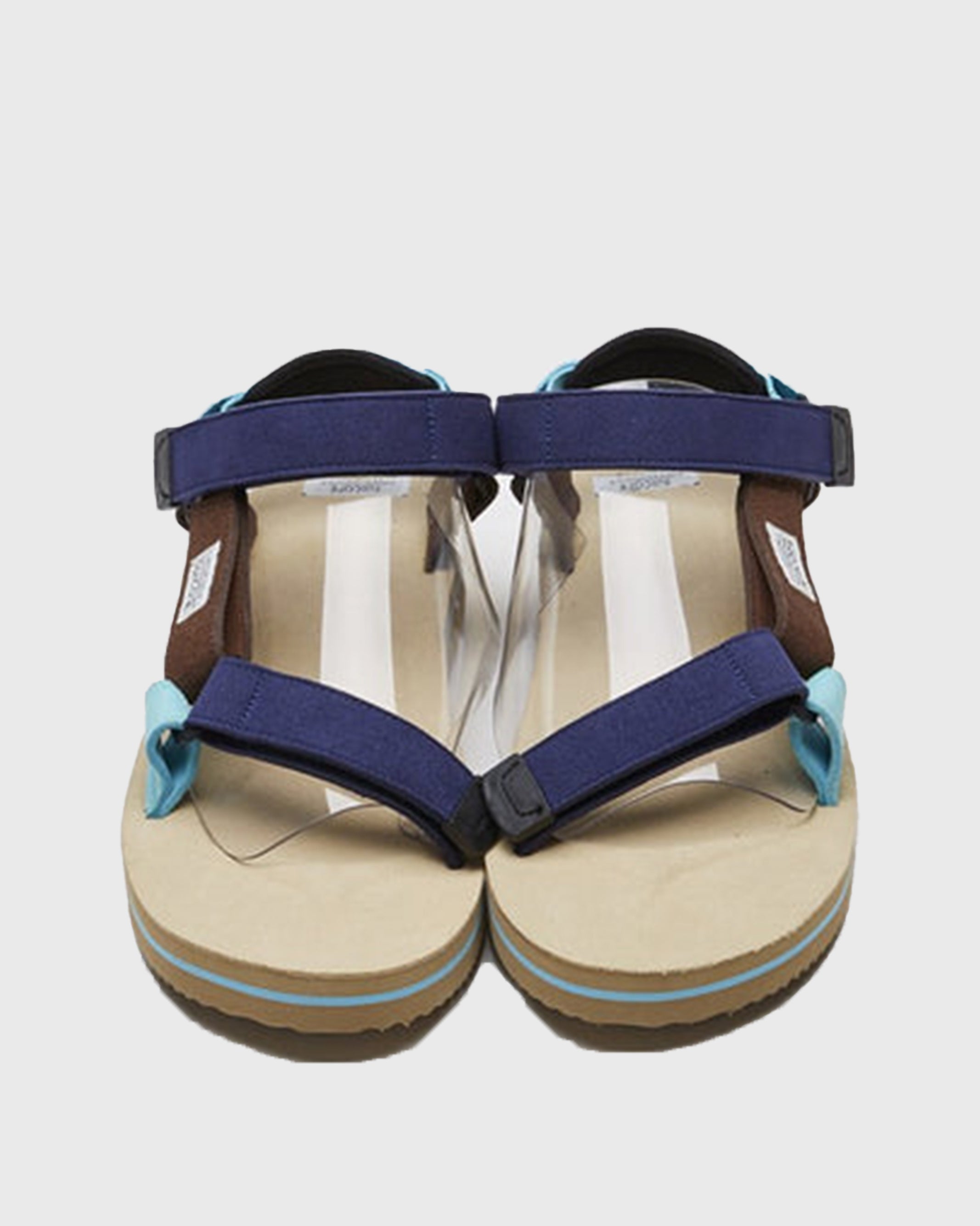 SUICOKE DEPA-ECS sandals with blue artificial leather upper, beige midsole and sole, straps and logo patch. From Spring/Summer 2022 collection on SUICOKE Official US & Canada Webstore.