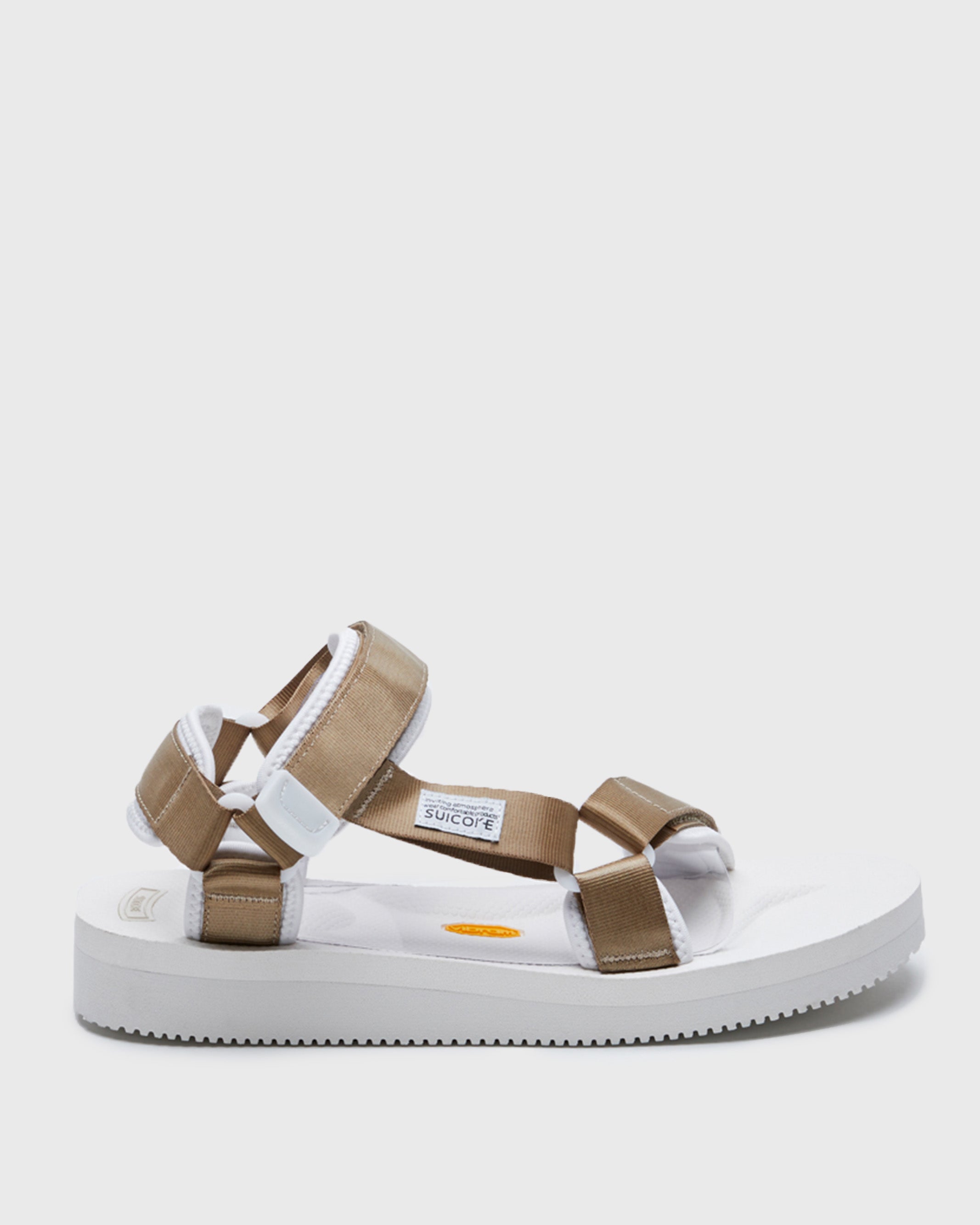 SUICOKE DEPA-V2 strap sandal with white midsole and sole, white straps with beige nylon straps on the SUICOKE Official US & Canada Webstore.