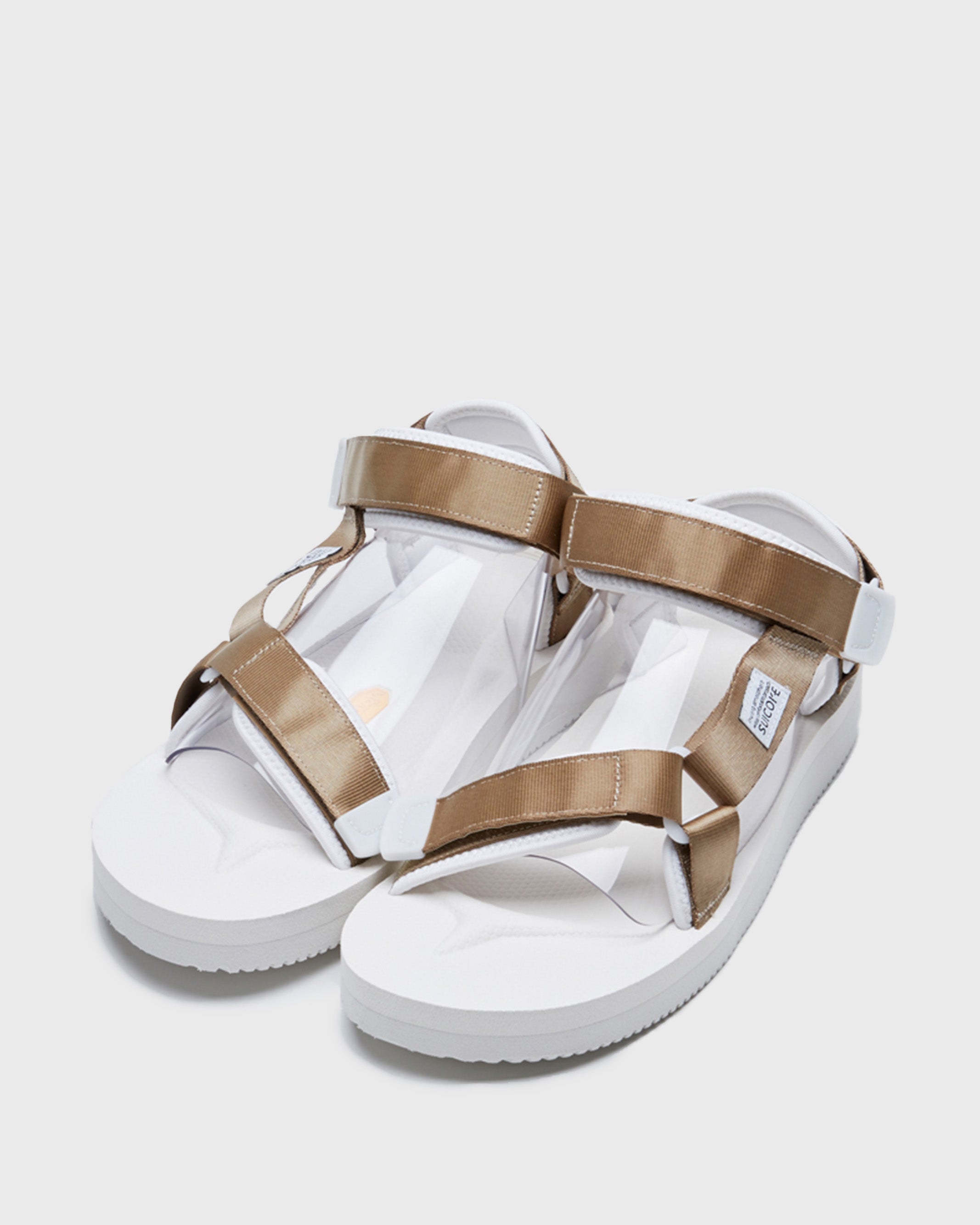 SUICOKE DEPA-V2 strap sandal with white midsole and sole, white straps with beige nylon straps on the SUICOKE Official US & Canada Webstore.