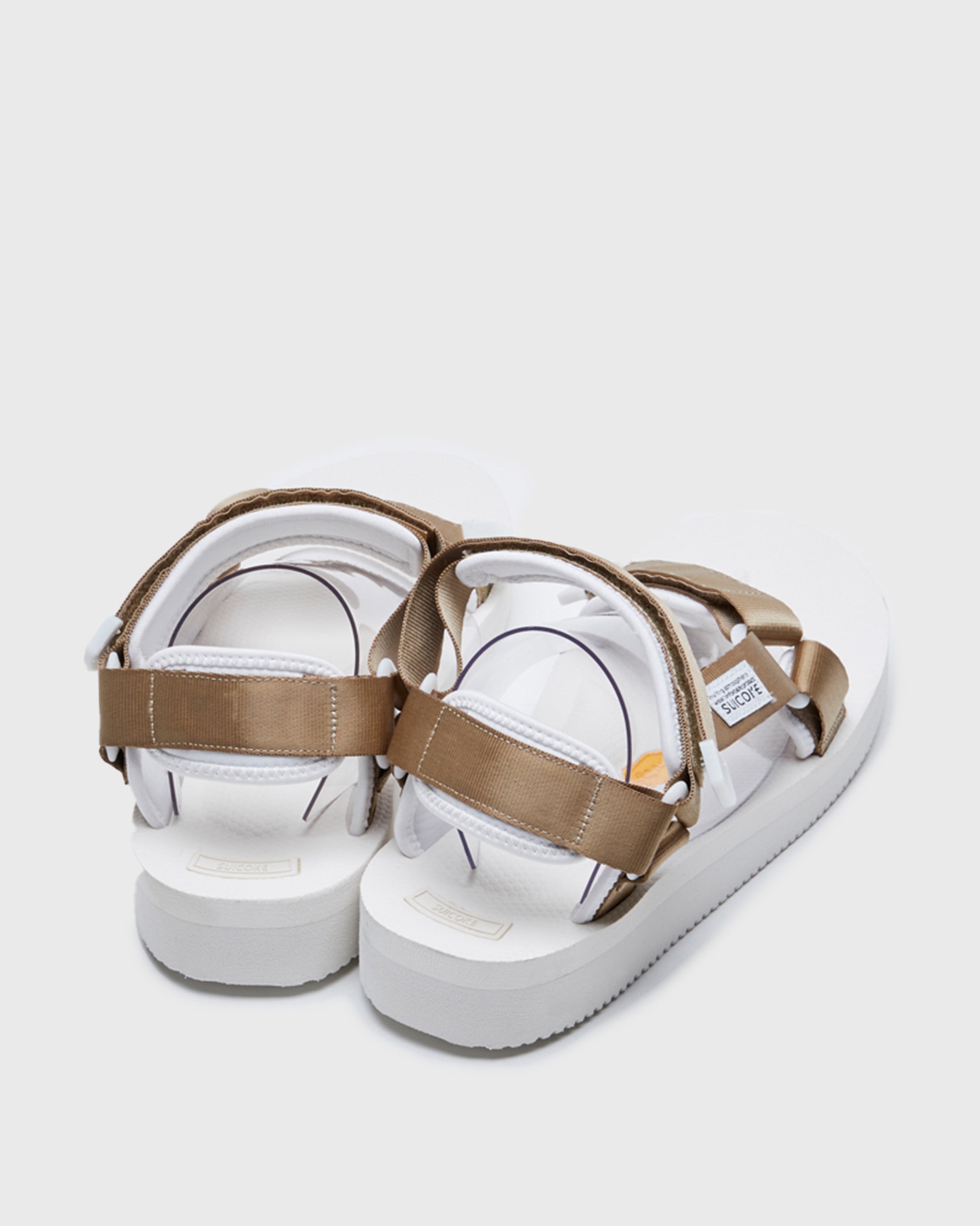 SUICOKE DEPA-V2 strap sandal with white midsole and sole, white straps with beige nylon straps on the SUICOKE Official US & Canada Webstore.