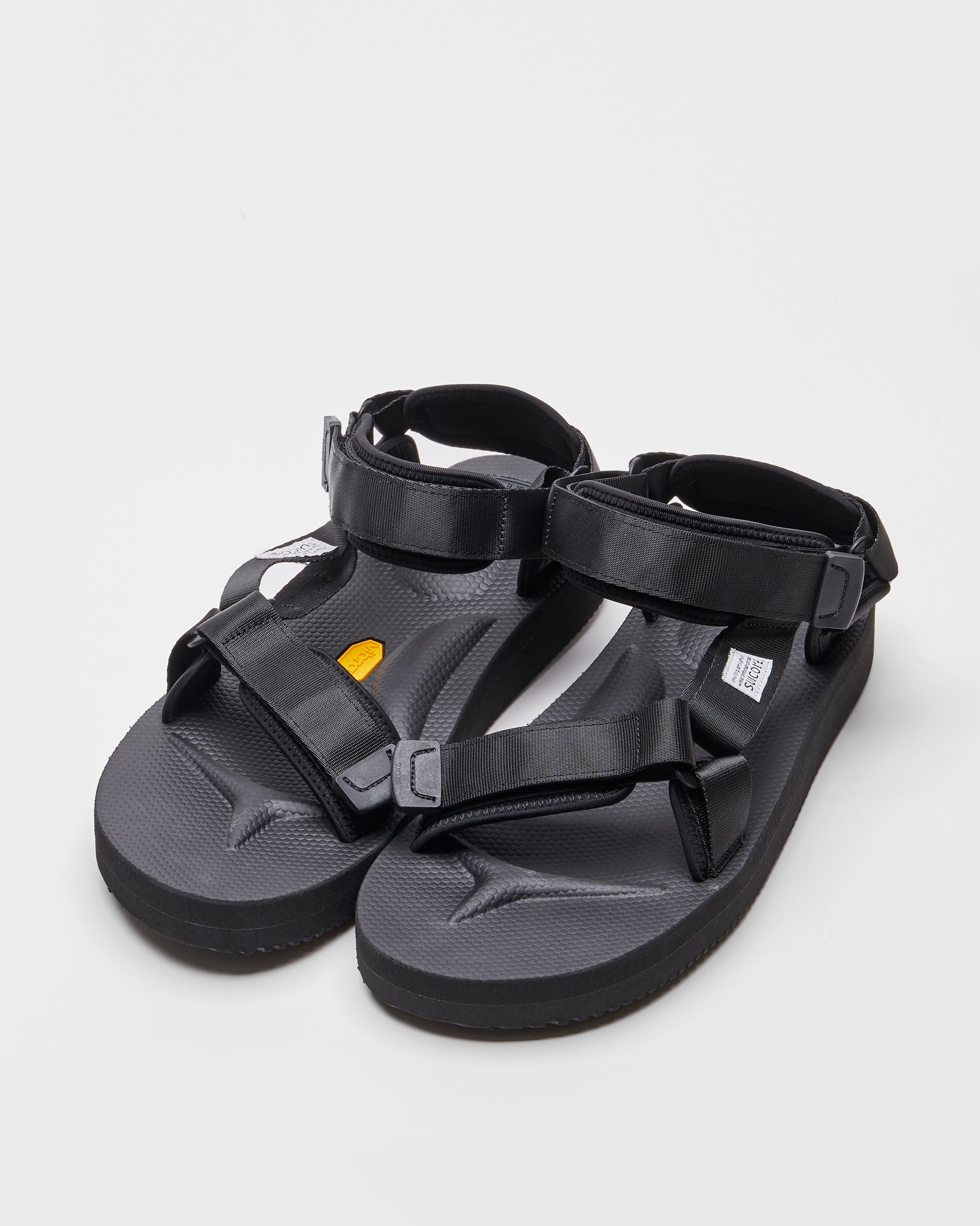 SUICOKE DEPA-V2 sandals with black nylon upper, black midsole and sole, strap and logo patch. From Spring/Summer 2022 collection on SUICOKE Official US & Canada Webstore. 