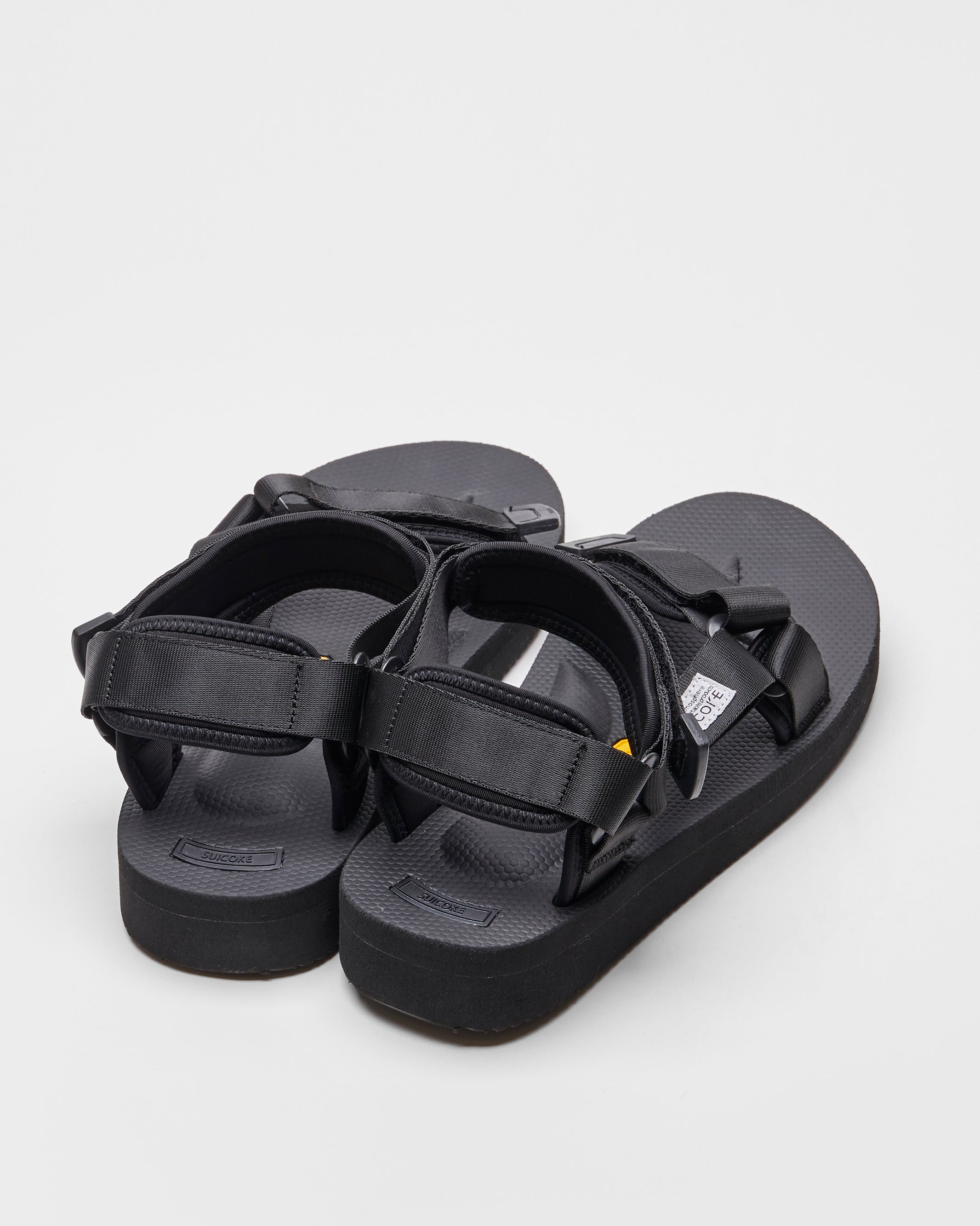 SUICOKE DEPA-V2 sandals with black nylon upper, black midsole and sole, strap and logo patch. From Spring/Summer 2022 collection on SUICOKE Official US & Canada Webstore.