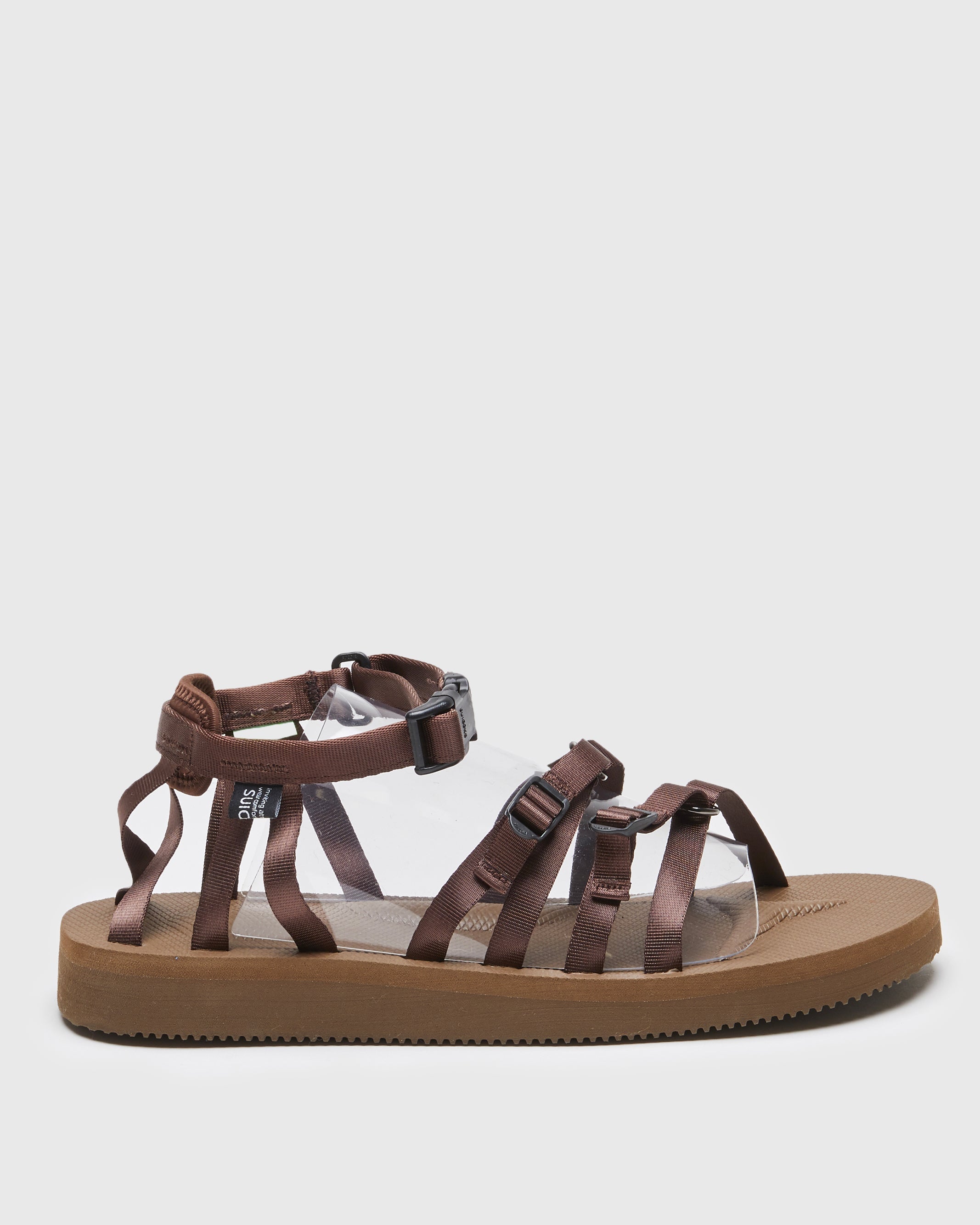 SUICOKE TOSSHI-V sandals with brown nylon upper, brown midsole and sole, straps and logo patch. From Spring/Summer 2022 collection on SUICOKE Official US & Canada Webstore.