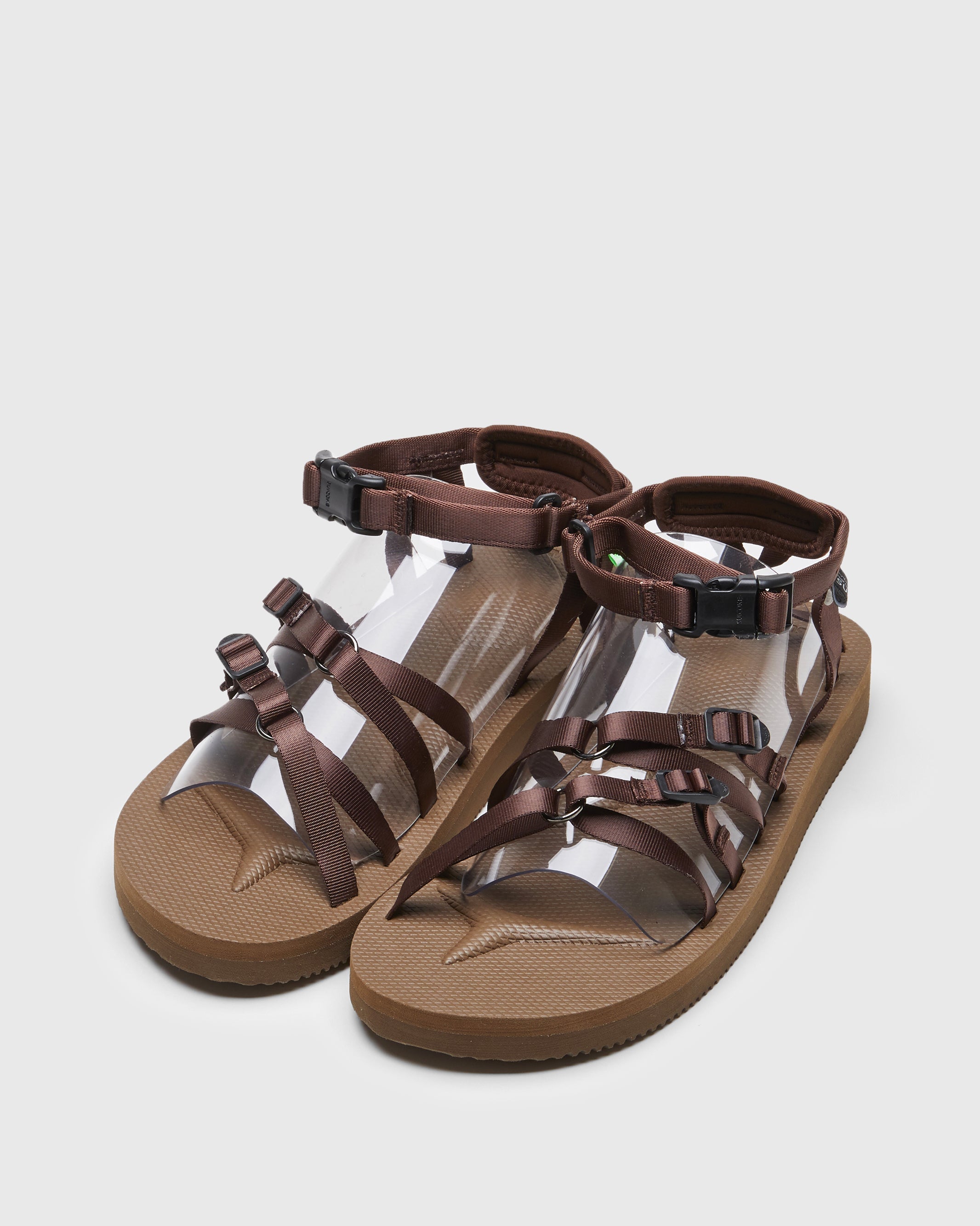 SUICOKE TOSSHI-V sandals with brown nylon upper, brown midsole and sole, straps and logo patch. From Spring/Summer 2022 collection on SUICOKE Official US & Canada Webstore.