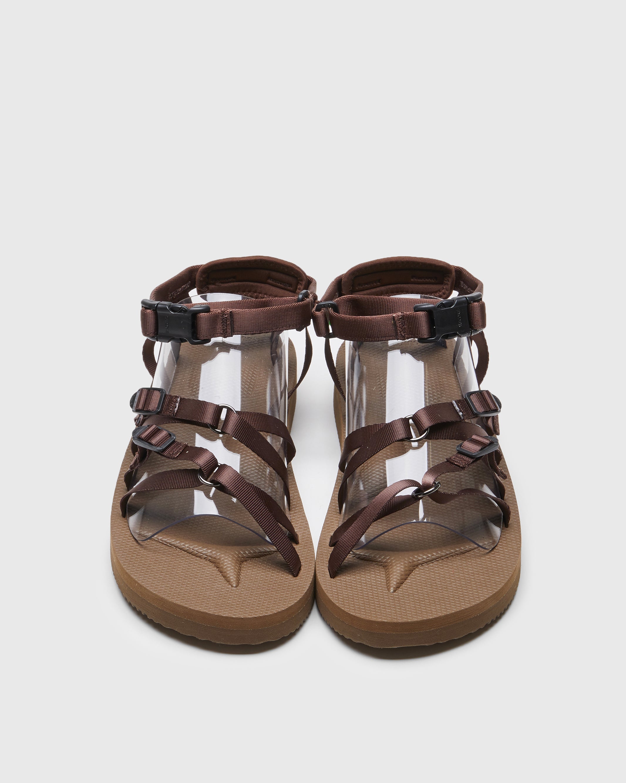 SUICOKE TOSSHI-V sandals with brown nylon upper, brown midsole and sole, straps and logo patch. From Spring/Summer 2022 collection on SUICOKE Official US & Canada Webstore.