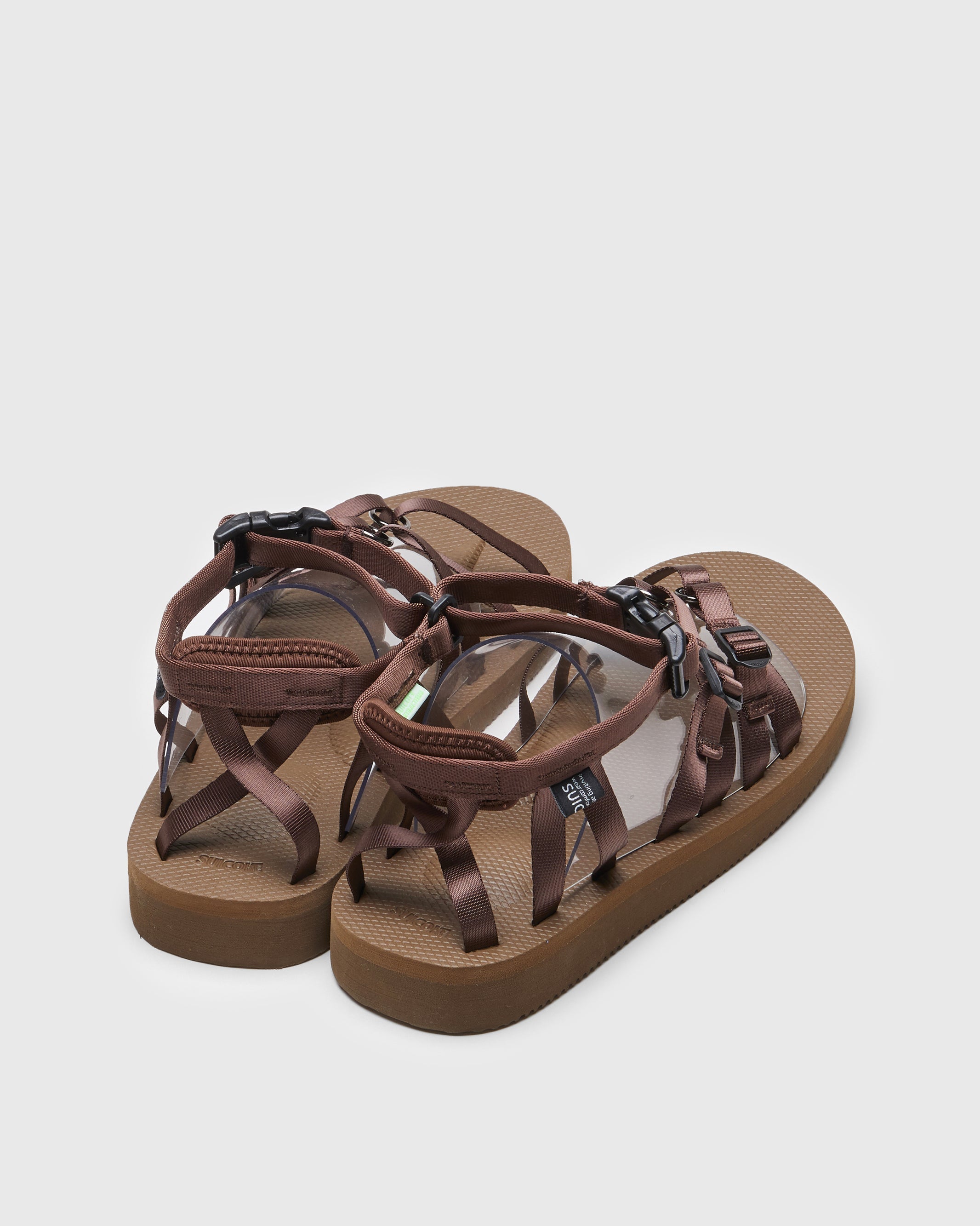 SUICOKE TOSSHI-V sandals with brown nylon upper, brown midsole and sole, straps and logo patch. From Spring/Summer 2022 collection on SUICOKE Official US & Canada Webstore.