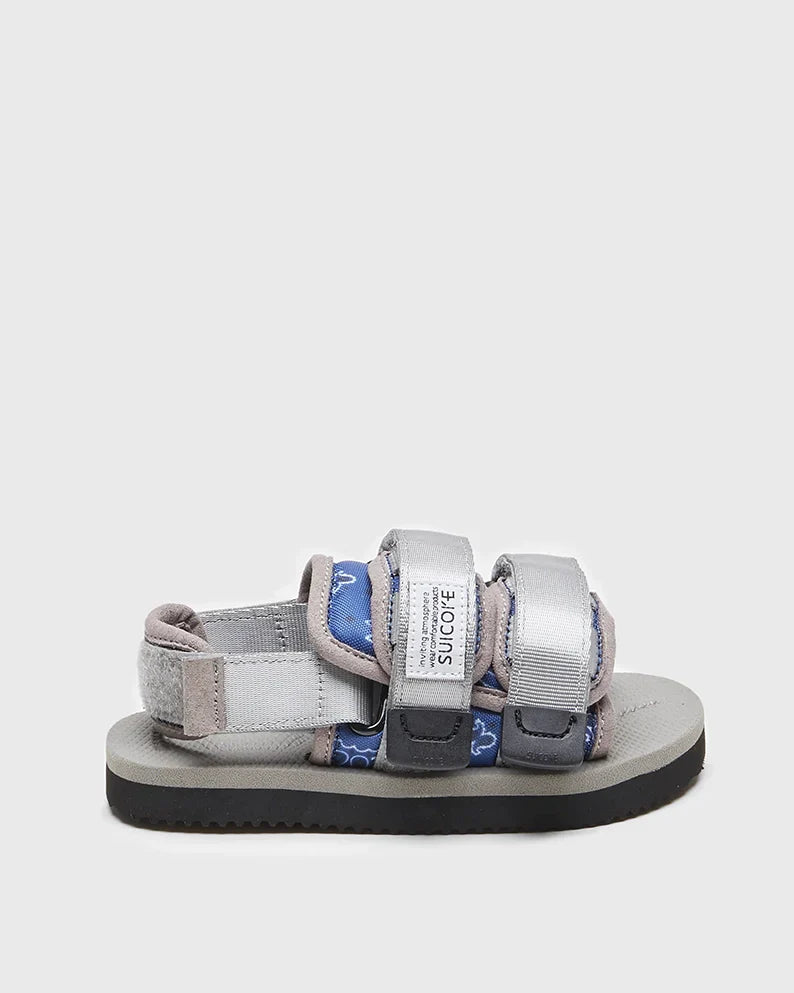 SUICOKE MOTO-2kids-PT05 slides with navy & gray nylon upper, navy & gray midsole and sole, strap and logo patch. From Spring/Summer 2023 collection on SUICOKE Official US & Canada Webstore. OG-056-2KIDS-PT05 NAVY X GRAY