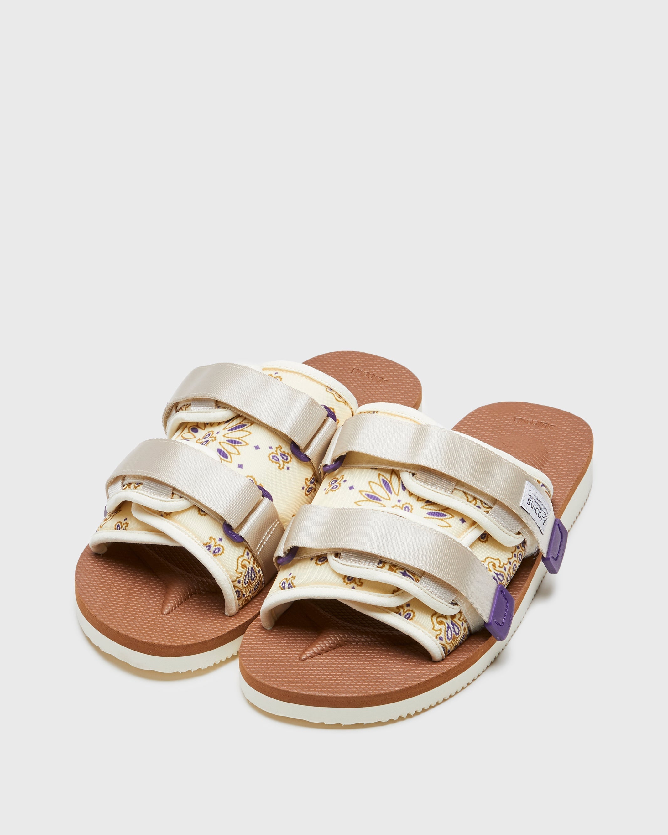 SUICOKE MOTO-Cab-PT05 sandals with ivory & brown nylon upper, ivory & brown midsole and sole, strap and logo patch. From Spring/Summer 2023 collection on SUICOKE Official US & Canada Webstore. OG-056CAB-PT05 IVORY X BROWN