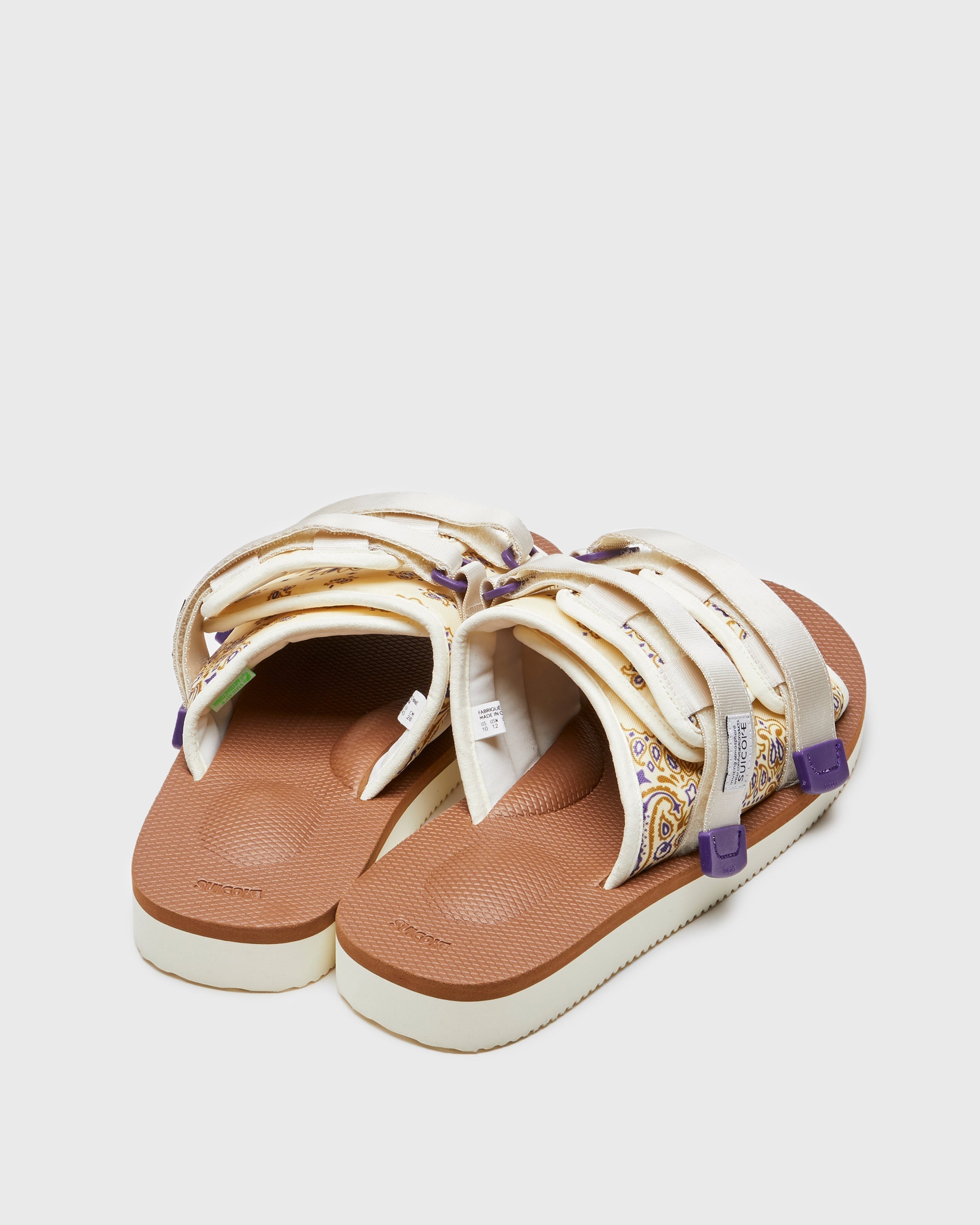 SUICOKE MOTO-Cab-PT05 sandals with ivory & brown nylon upper, ivory & brown midsole and sole, strap and logo patch. From Spring/Summer 2023 collection on SUICOKE Official US & Canada Webstore. OG-056CAB-PT05 IVORY X BROWN