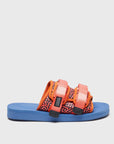 SUICOKE MOTO-Cab-PT06 slides with orange & navy nylon upper, orange & navy midsole and sole, strap and logo patch. From Spring/Summer 2023 collection on SUICOKE Official US & Canada Webstore. OG-056CAB-PT06 ORANGE X NAVY