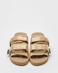 SUICOKE MOTO-Cab slides with beige nylon upper, beige midsole and sole, straps and logo patch. From Spring/Summer 2022 collection on SUICOKE Official US & Canada Webstore.