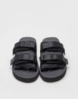 SUICOKE MOTO-Cab slides with black nylon upper, black midsole and sole, straps and logo patch. From Spring/Summer 2022 collection on SUICOKE Official US & Canada Webstore.