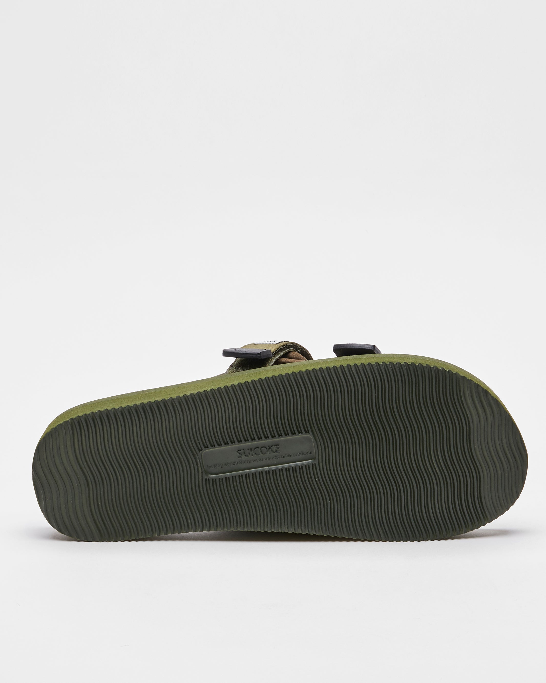 SUICOKE MOTO-Cab slides with olive nylon upper, olive midsole and sole, straps and logo patch. From Spring/Summer 2023 collection on SUICOKE Official US & Canada Webstore. OG-056CAB OLIVE