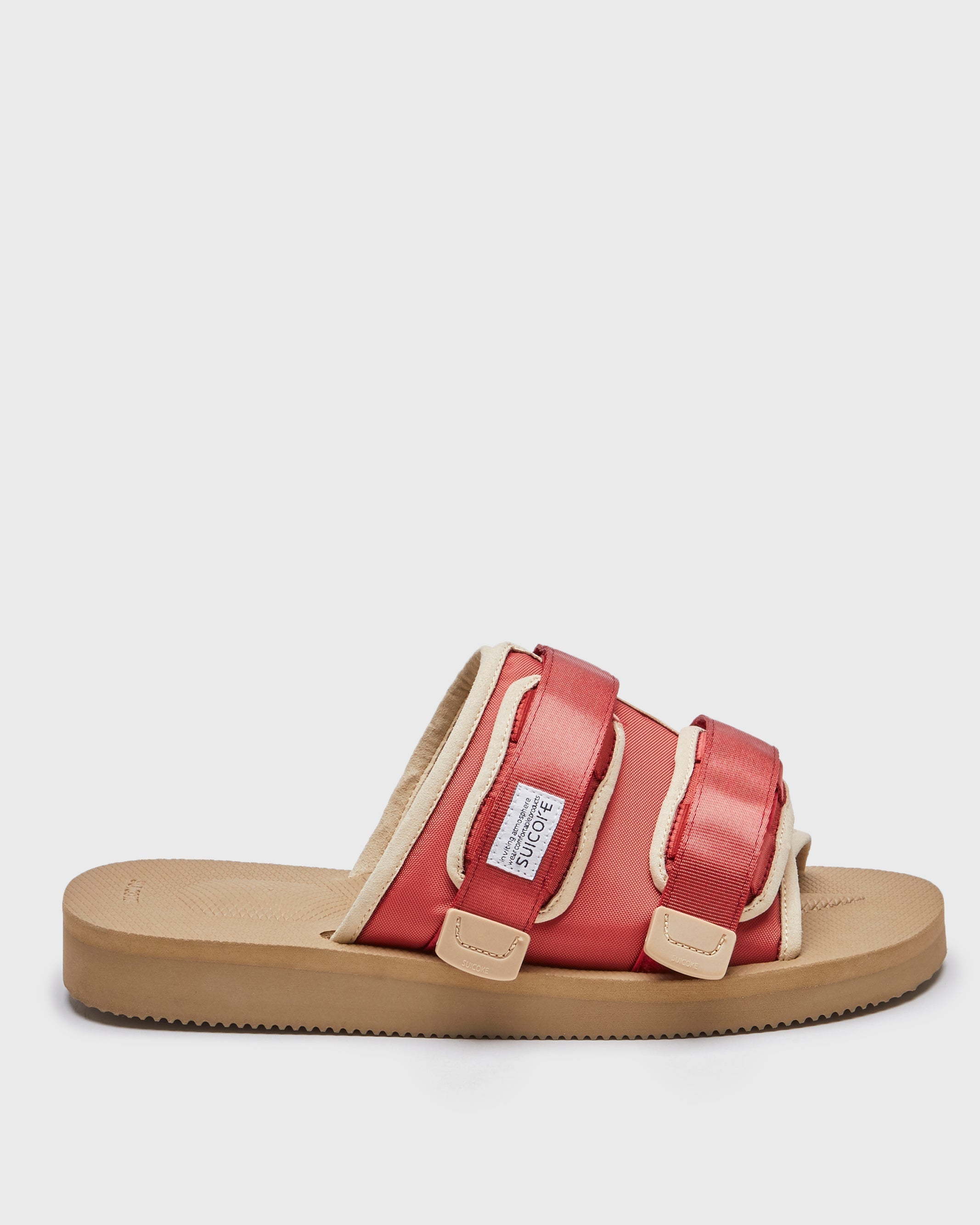 SUICOKE MOTO-Cab slides with red clay nylon upper, red clay midsole and sole, straps and logo patch. From Spring/Summer 2023 collection on SUICOKE Official US & Canada Webstore. OG-056CAB RED CLAY