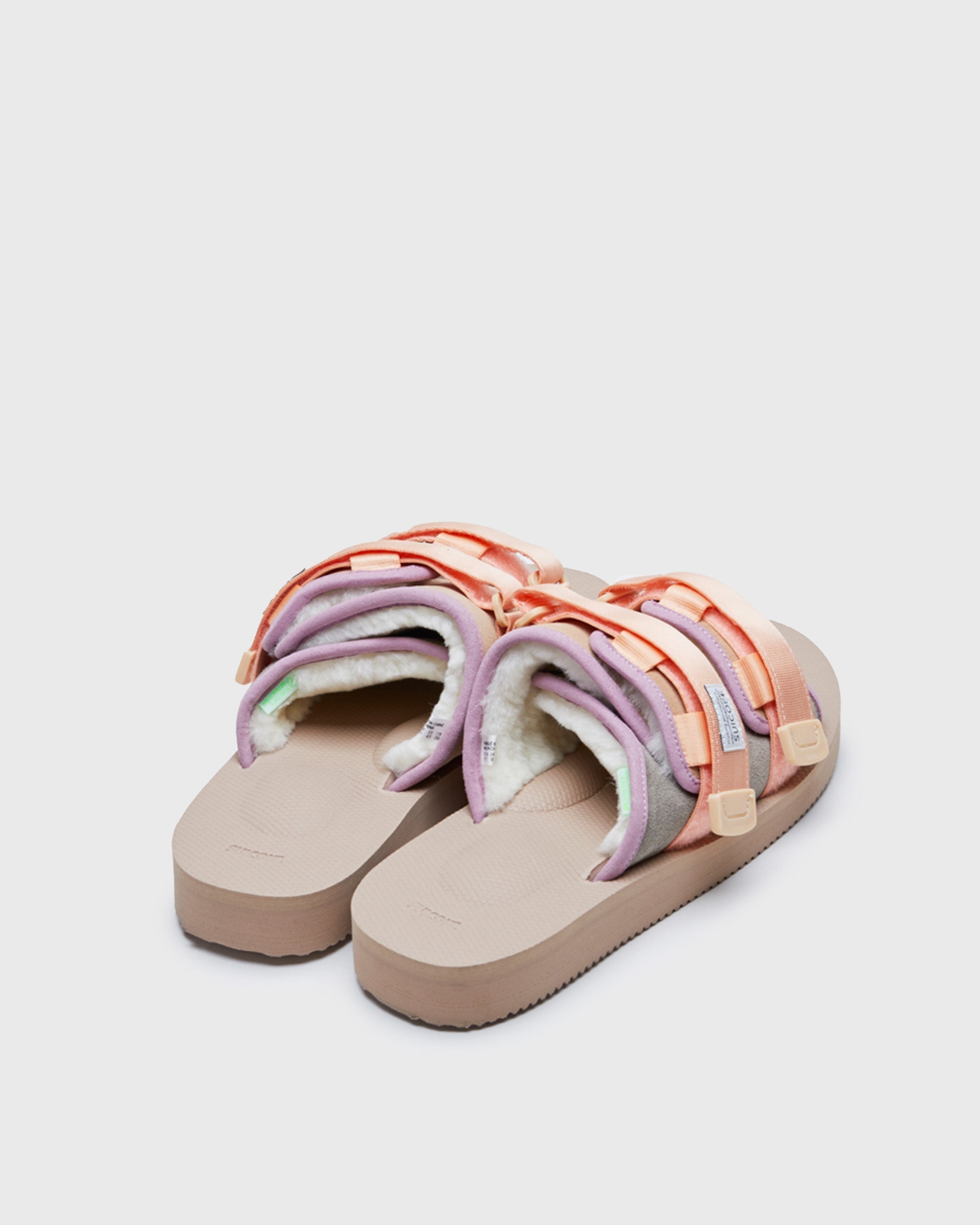 SUICOKE MOTO-Mab suede slides with beige midsole and sole, gray suede upper and shearling inside with light purple piping and light pink nylon straps. From Fall/Winter 2021 collection on SUICOKE Official US & Canada Webstore.