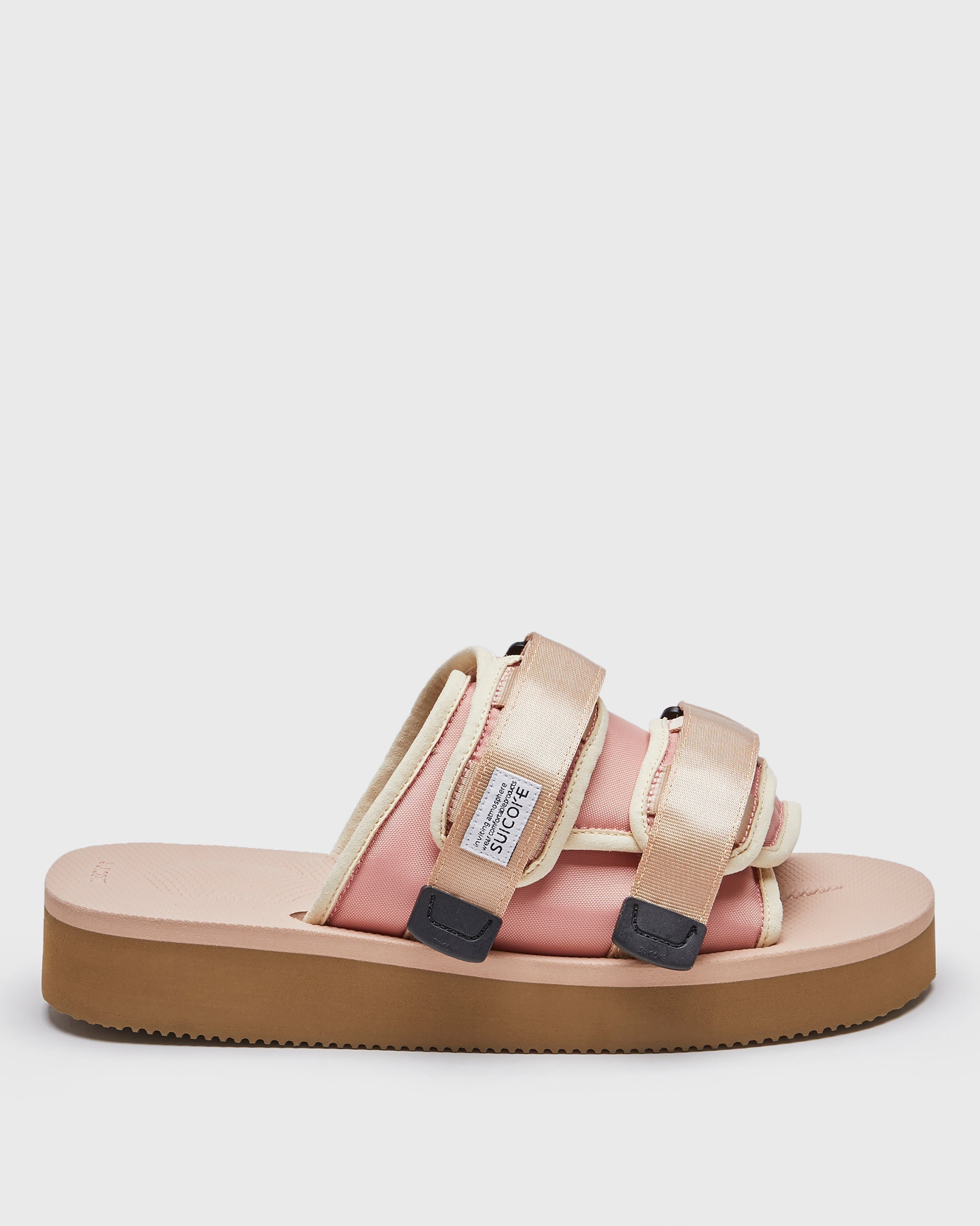 SUICOKE MOTO-PO slides with pink granite nylon upper, pink granite midsole and sole, strap and logo patch. From Spring/Summer 2023 collection on SUICOKE Official US & Canada Webstore. OG-056PO PINK GRANITE