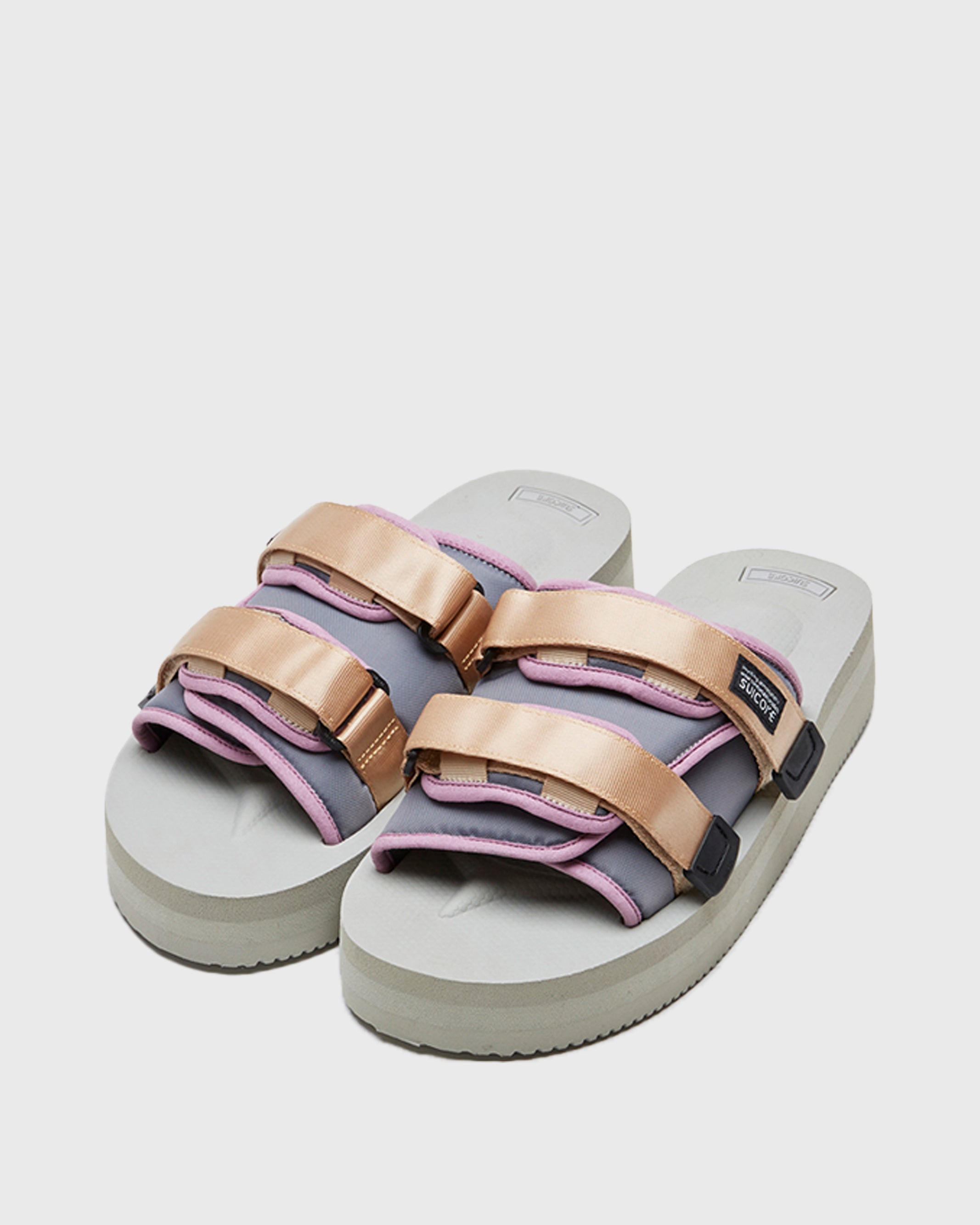 SUICOKE MOTO-VPO slides with lt.beige x purple nylon upper, gray midsole and sole, straps and logo patch. From Spring/Summer 2022 collection on SUICOKE Official US & Canada Webstore.