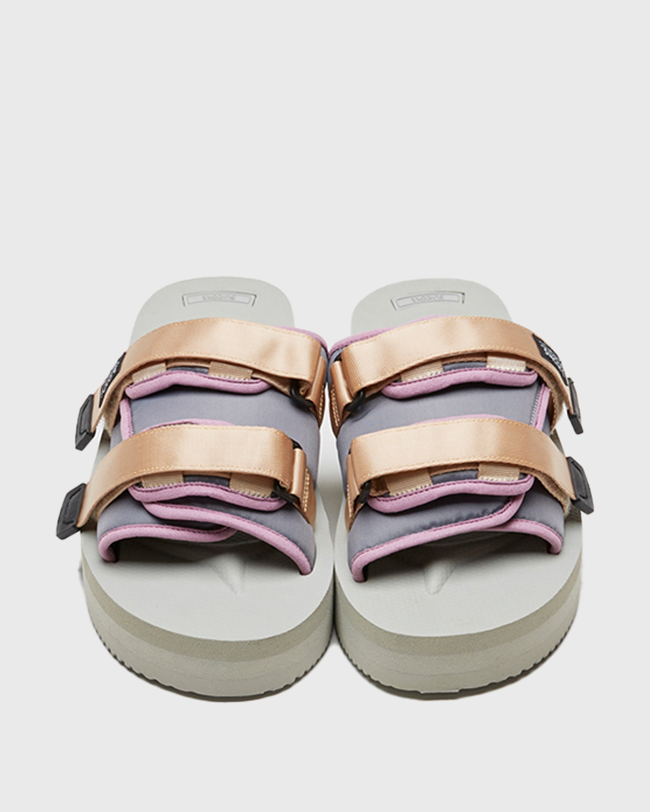 SUICOKE MOTO-VPO slides with lt.beige x purple nylon upper, gray midsole and sole, straps and logo patch. From Spring/Summer 2022 collection on SUICOKE Official US & Canada Webstore.