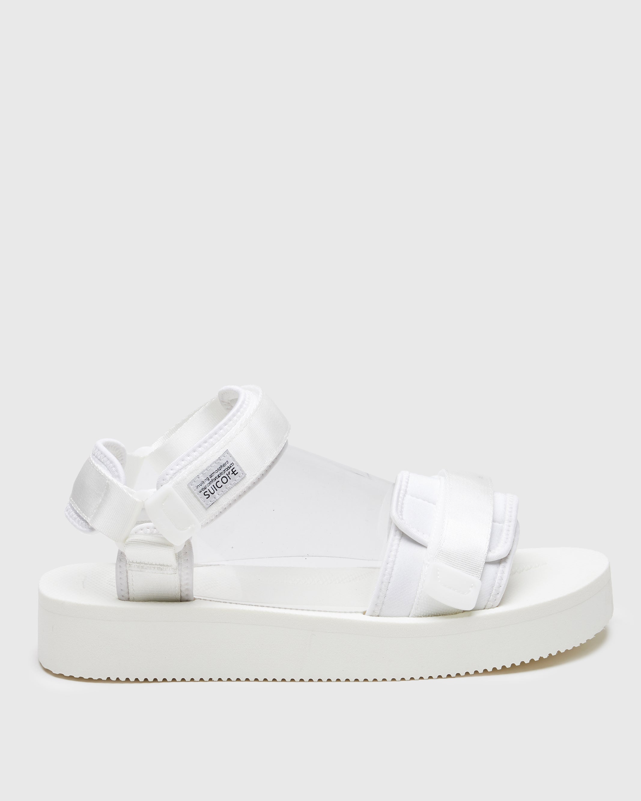 SUICOKE CEL-PO sandals with white nylon upper, white midsole and sole, strap and logo patch. From Spring/Summer 2023 collection on SUICOKE Official US & Canada Webstore. OG-064PO WHITE