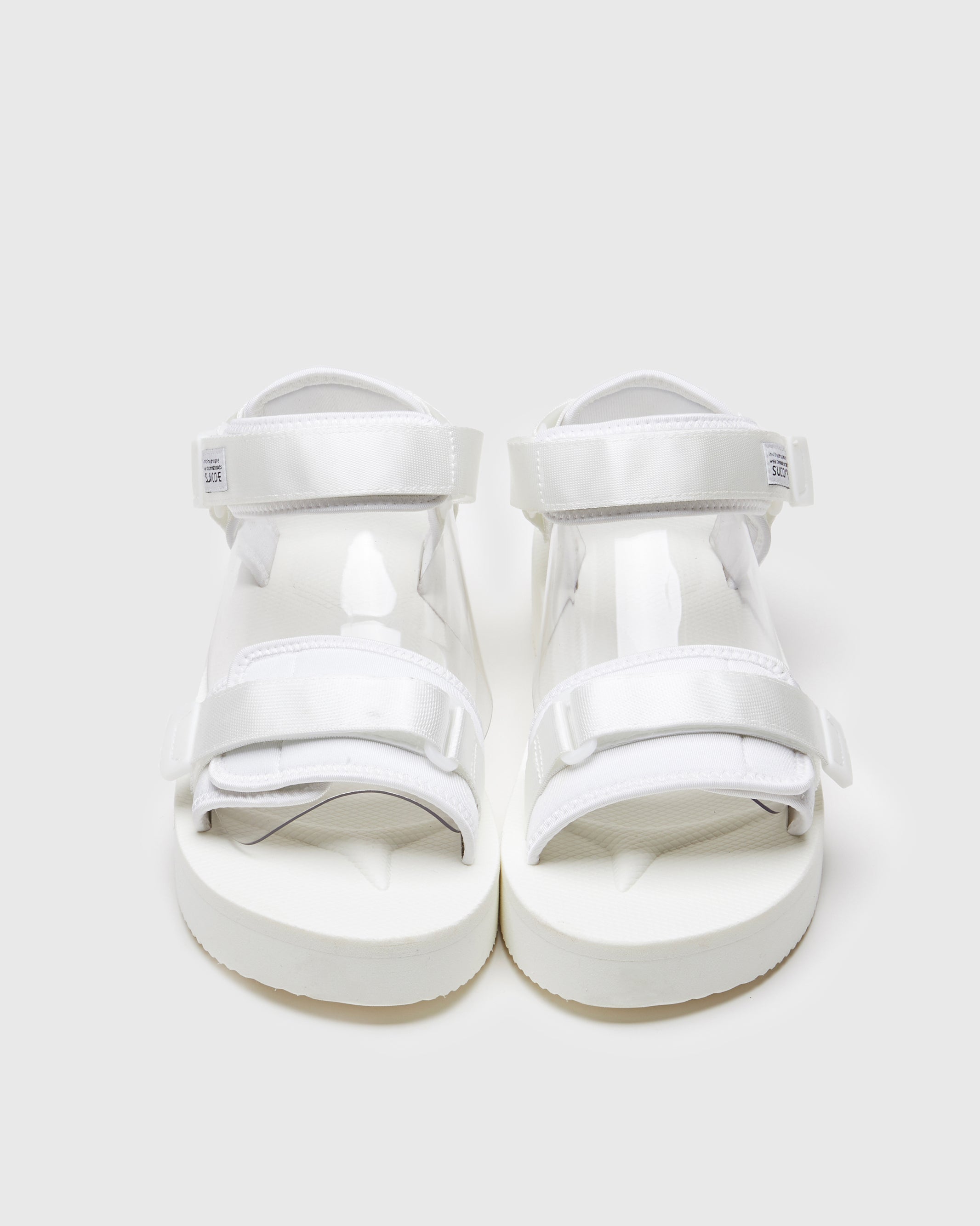 SUICOKE CEL-PO sandals with white nylon upper, white midsole and sole, strap and logo patch. From Spring/Summer 2023 collection on SUICOKE Official US & Canada Webstore. OG-064PO WHITE