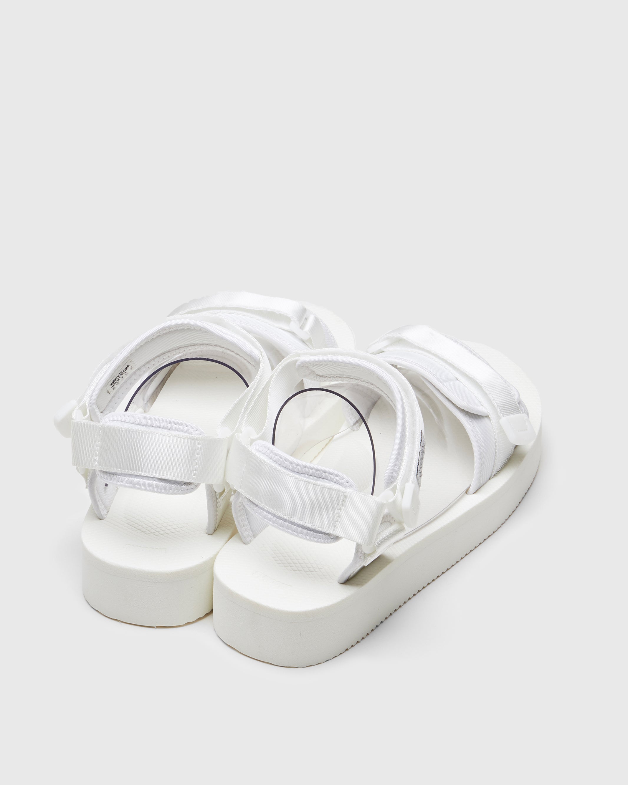 SUICOKE CEL-PO sandals with white nylon upper, white midsole and sole, strap and logo patch. From Spring/Summer 2023 collection on SUICOKE Official US & Canada Webstore. OG-064PO WHITE