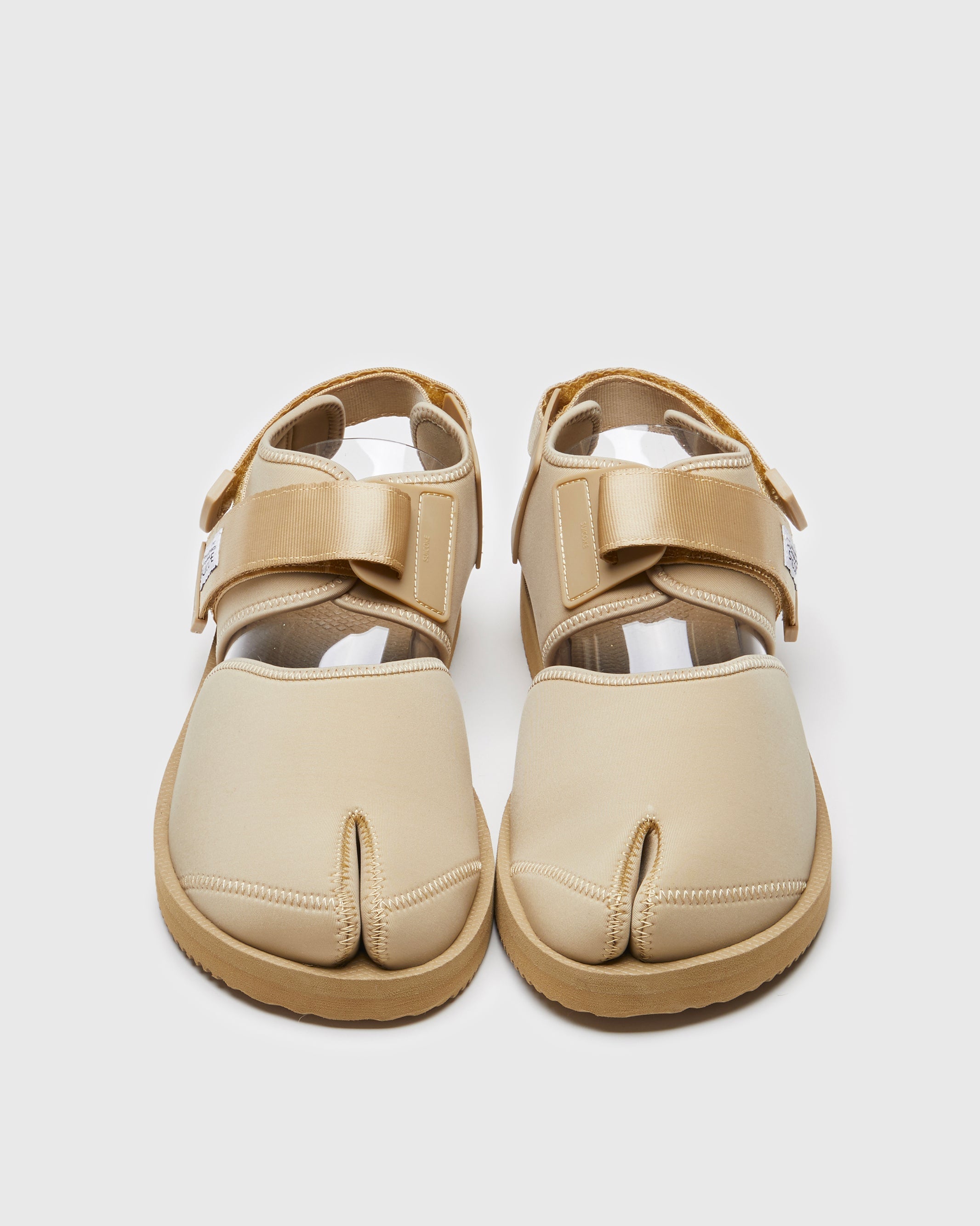 SUICOKE BITA-V shoes with beige nylon upper, beige midsole and sole, straps and logo patch. From Spring/Summer 2022 collection on SUICOKE Official US & Canada Webstore.