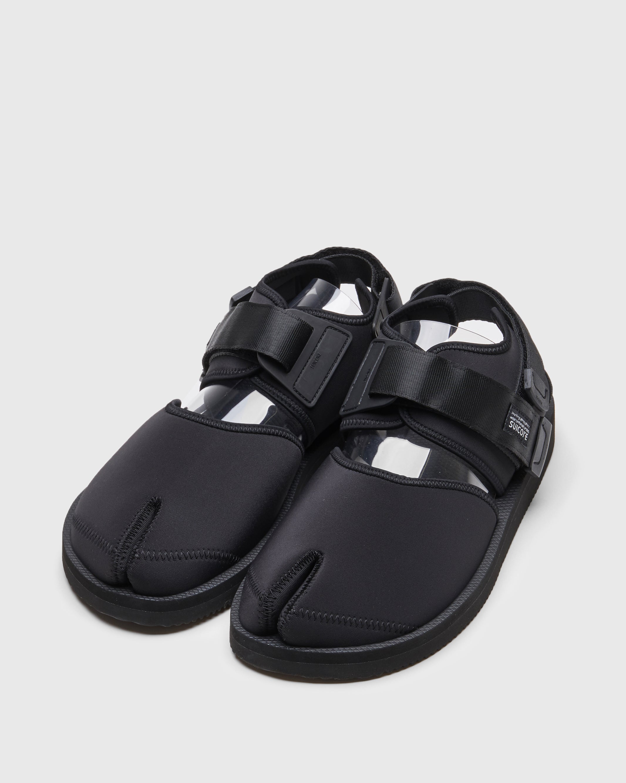 SUICOKE BITA-V shoes with black nylon upper, black midsole and sole, straps and logo patch. From Spring/Summer 2022 collection on SUICOKE Official US & Canada Webstore.