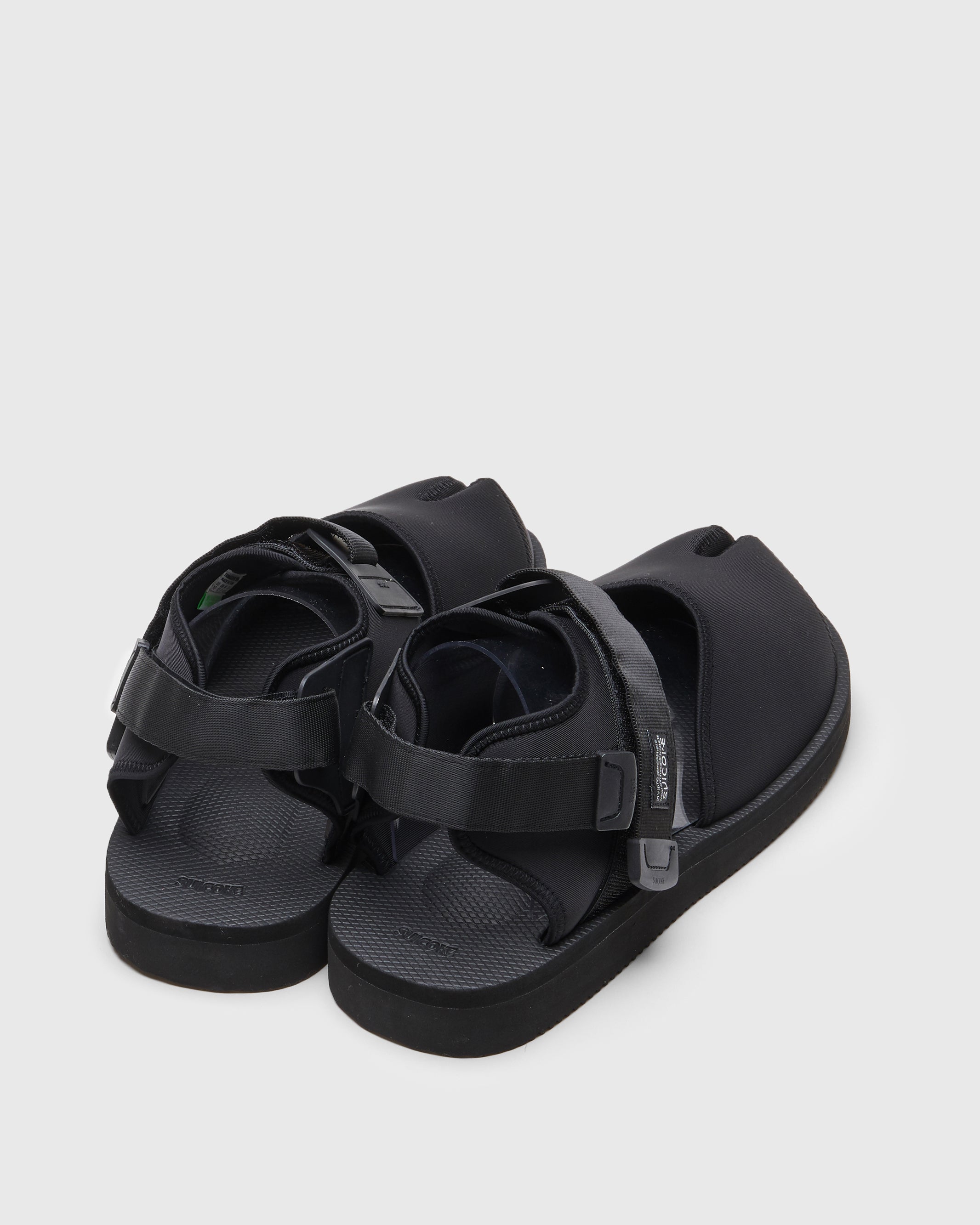 SUICOKE BITA-V shoes with black nylon upper, black midsole and sole, straps and logo patch. From Spring/Summer 2022 collection on SUICOKE Official US & Canada Webstore.