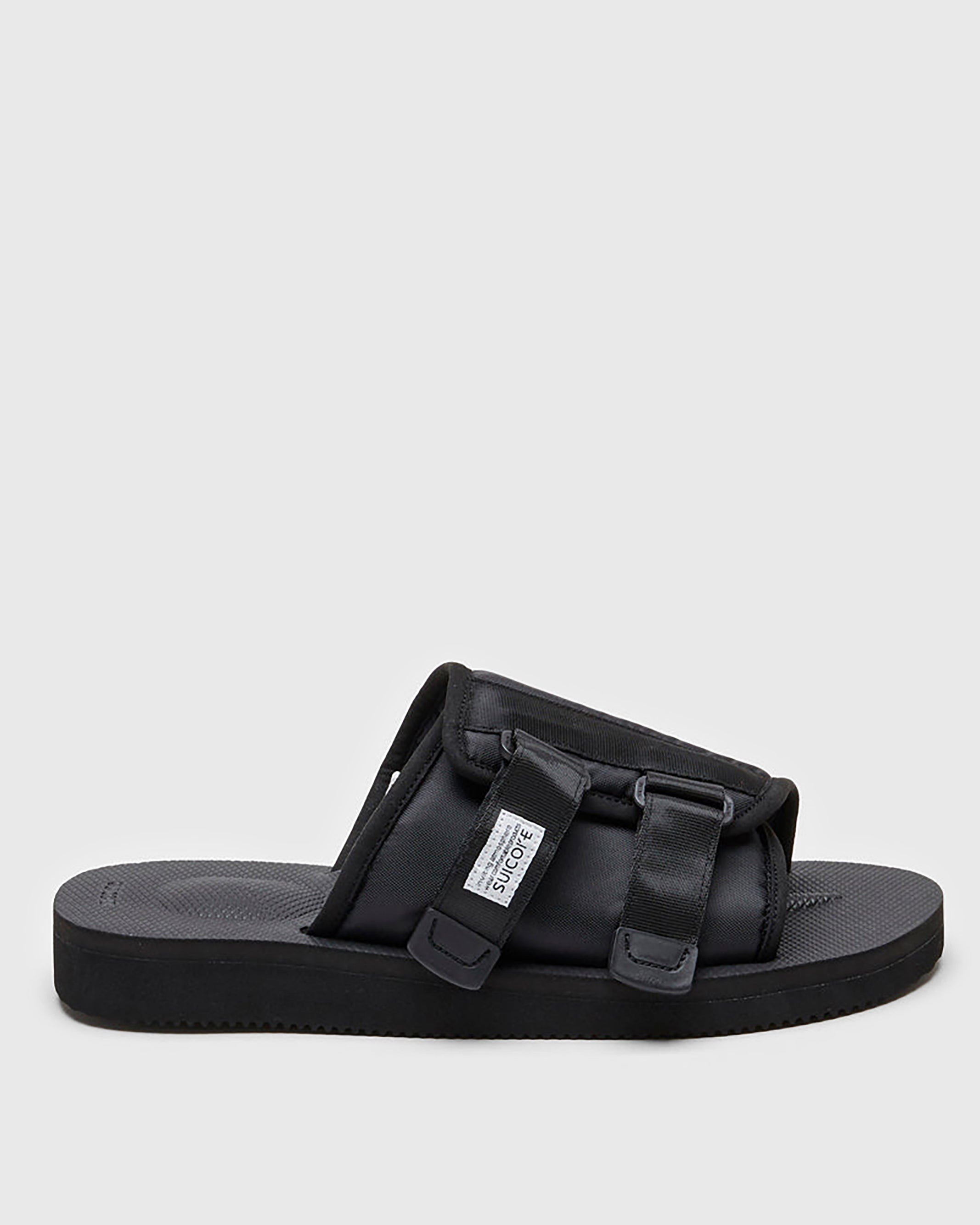 SUICOKE KAW-Cab slides with black nylon upper, black midsole and sole, strap and logo patch. From Spring/Summer 2023 collection on SUICOKE Official US & Canada Webstore OG-081CAB BLACK