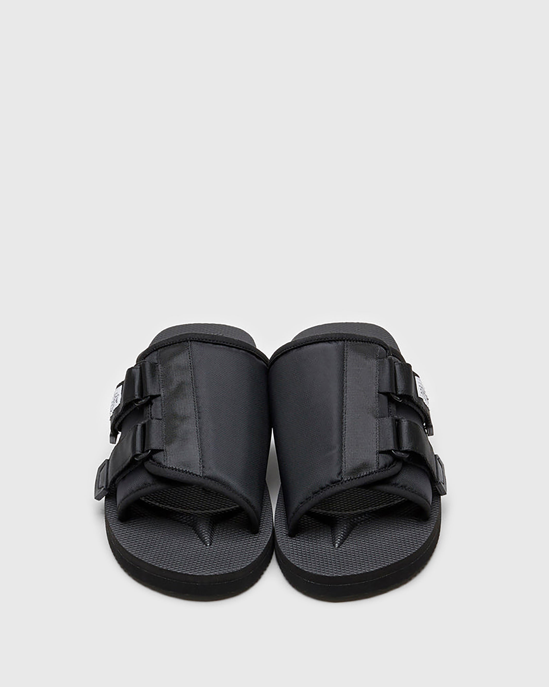 SUICOKE KAW-Cab slides with black nylon upper, black midsole and sole, strap and logo patch. From Spring/Summer 2023 collection on SUICOKE Official US & Canada Webstore OG-081CAB BLACK