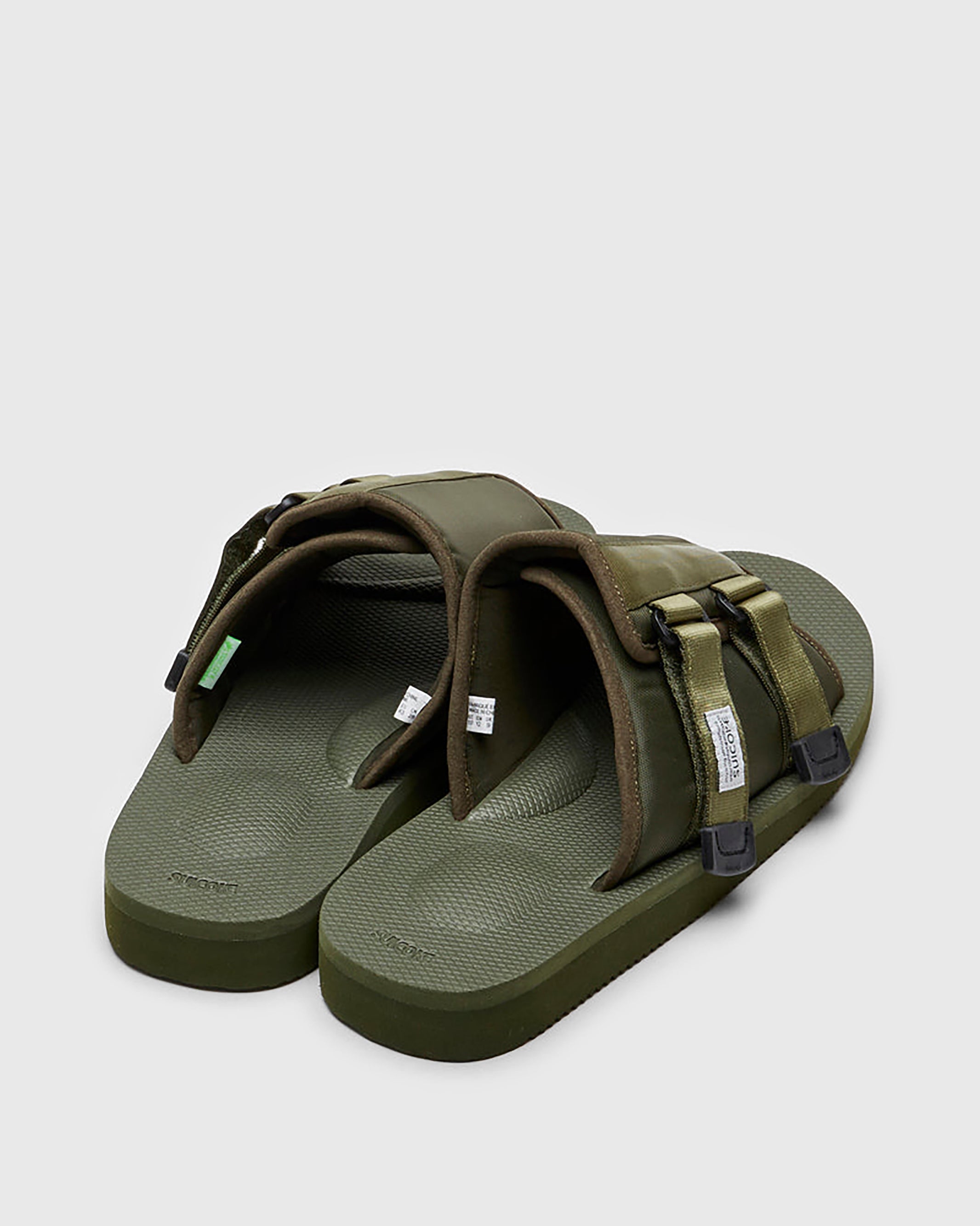 SUICOKE KAW-Cab sandals with olive nylon upper, olive midsole and sole, straps and logo patch. From Spring/Summer 2023 collection on SUICOKE Official US & Canada Webstore. OG-081CAB OLIVE