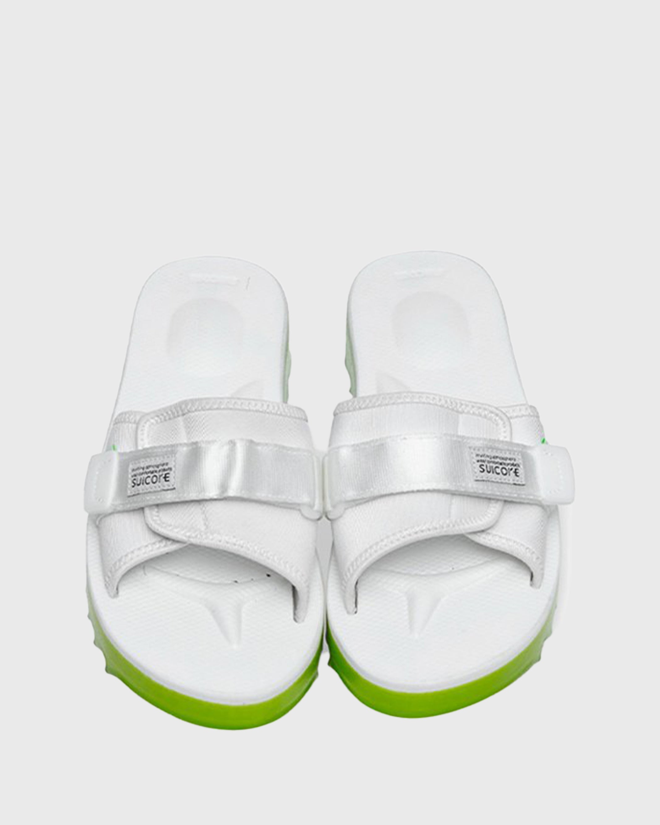 SUICOKE Padri-Slpoab neon green platform shark sole slide sandal, with white footbed and straps. From SUICOKE SS21 collection.