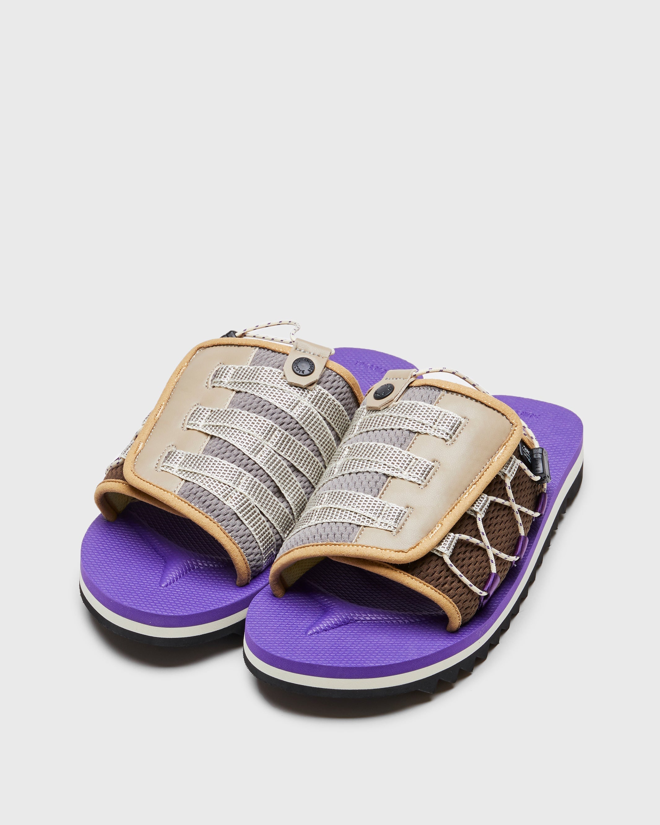 SUICOKE DAO-2AB slides with brown & purple nylon upper, brown & purple midsole and sole, strap and logo patch. From Spring/Summer 2023 collection on SUICOKE Official US & Canada Webstore. OG-195-2AB BROWN X PURPLE