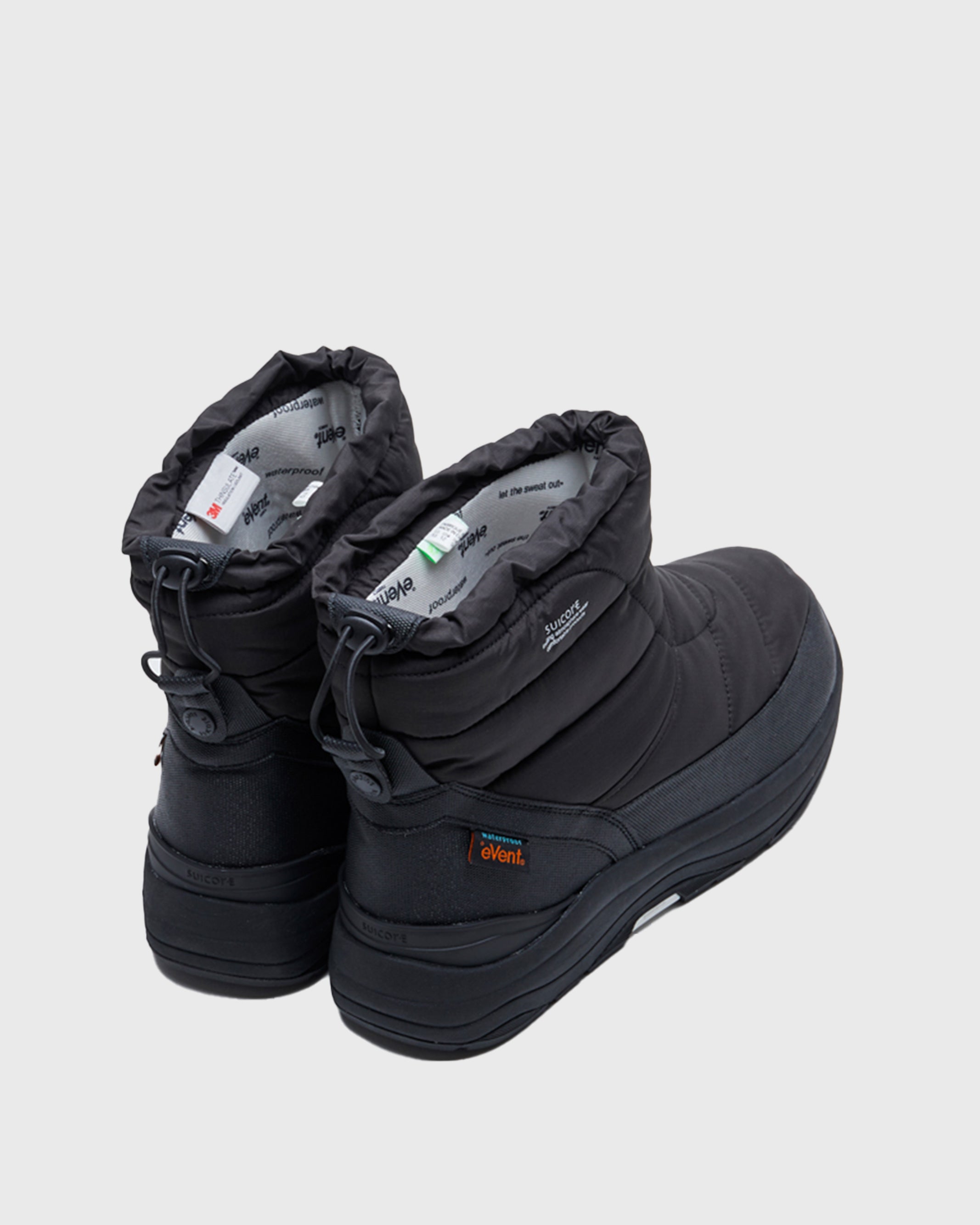 SUICOKE BOWER-evab low top ankle boots with black nylon upper and running sole with adjustable toggle cord closure. From Fall/Winter 2021 collection on SUICOKE Official US & Canada Webstore.