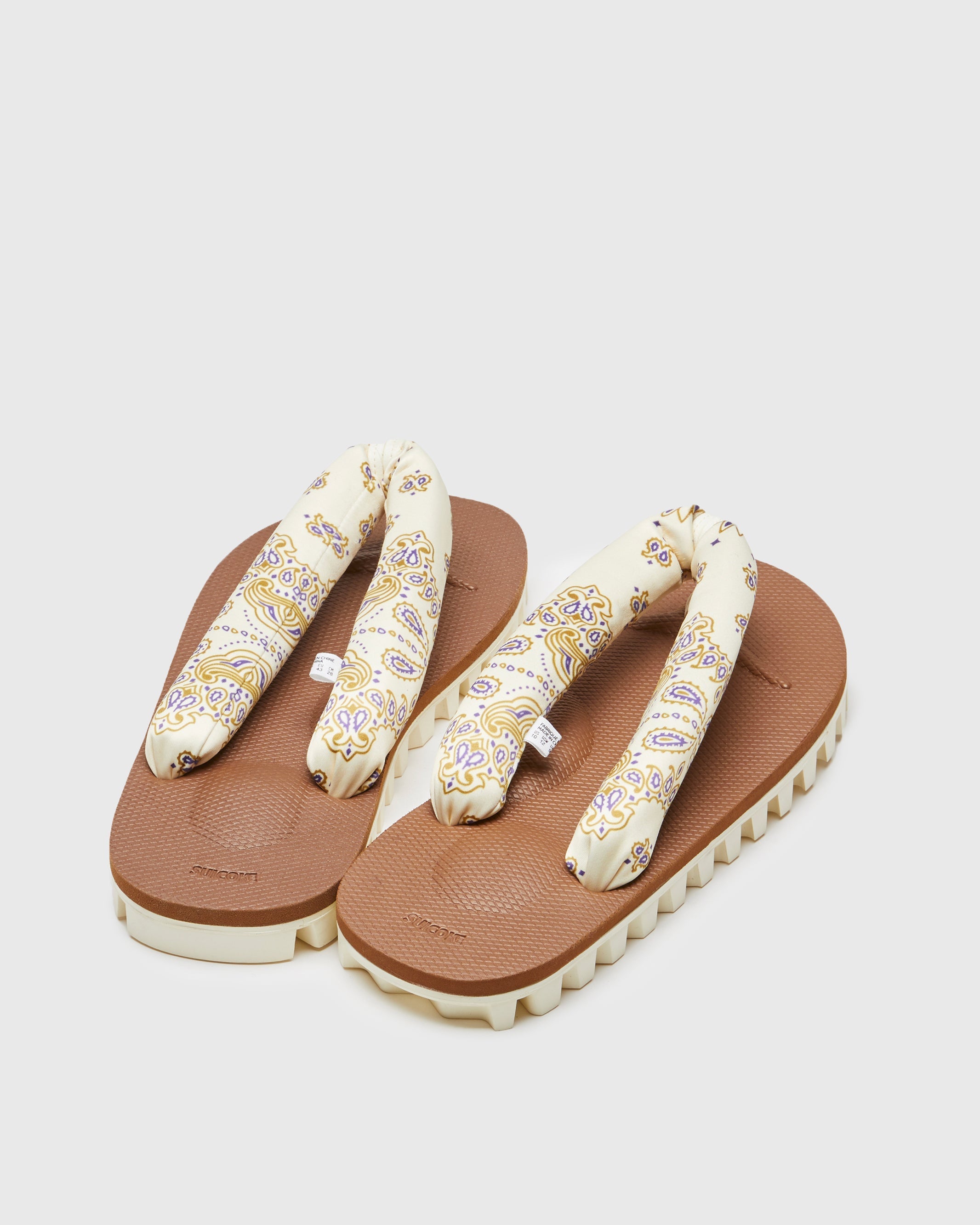 SUICOKE GTA-PT05 sandals with ivory & brown nylon upper, ivory & brown midsole and sole, straps and logo patch. From Spring/Summer 2023 collection on SUICOKE Official US & Canada Webstore. OG-226-PT05 IVORY X BROWN