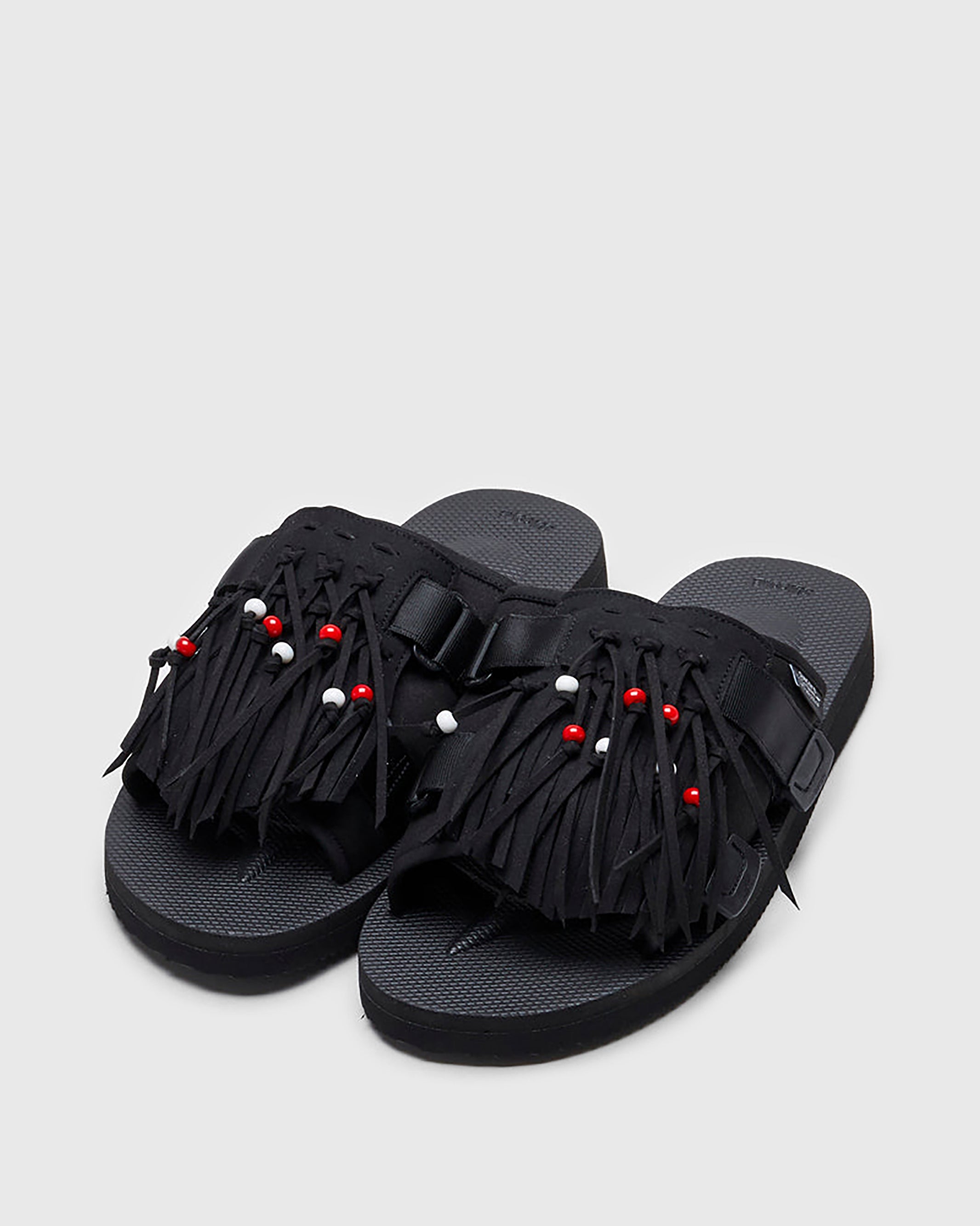 SUICOKE HOTO-Cab slides with black PU suede and nylon upper, black midsole and sole, straps and logo patch. From Spring/Summer 2022 collection on SUICOKE Official US & Canada Webstore.