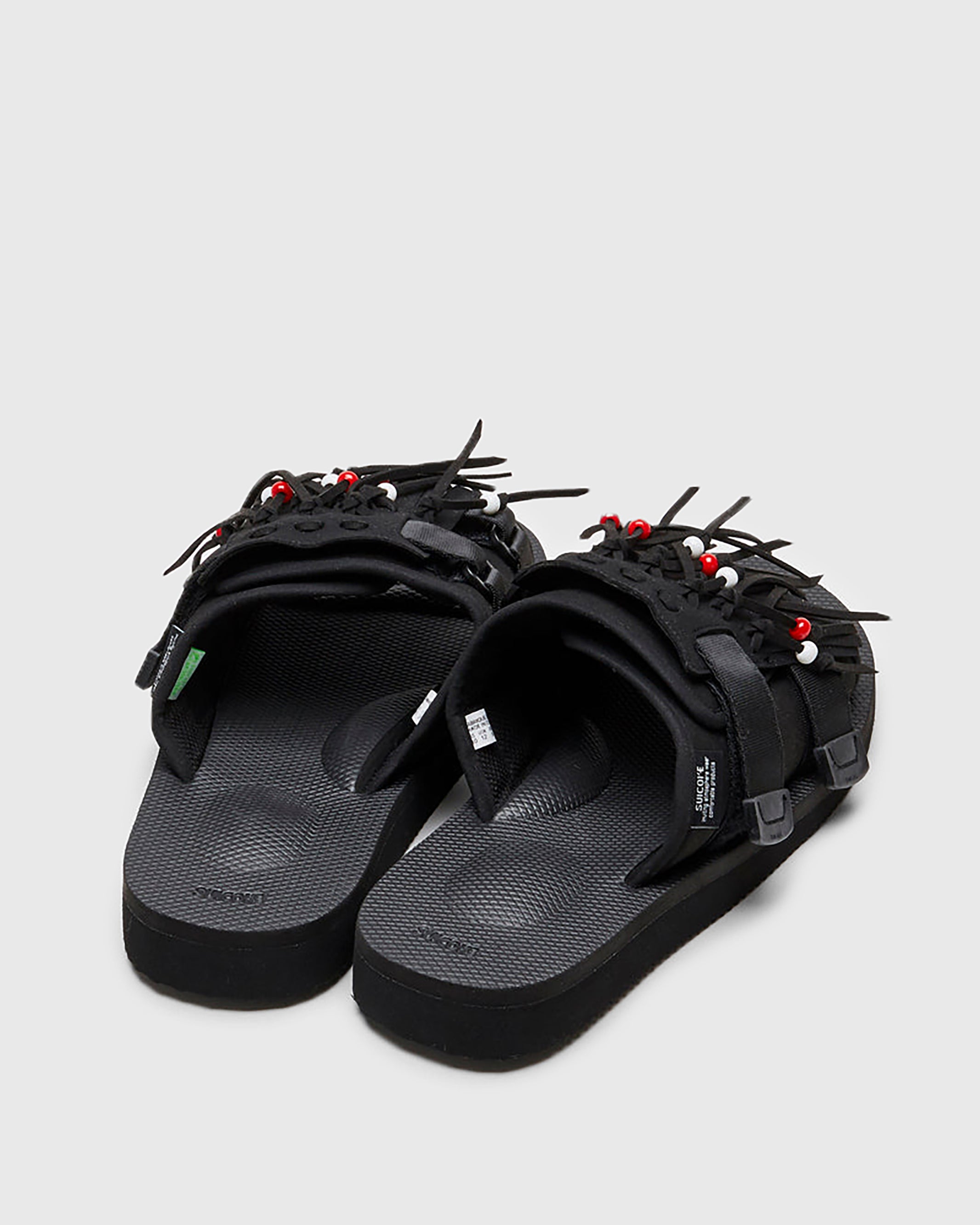 SUICOKE HOTO-Cab slides with black PU suede and nylon upper, black midsole and sole, straps and logo patch. From Spring/Summer 2022 collection on SUICOKE Official US & Canada Webstore.