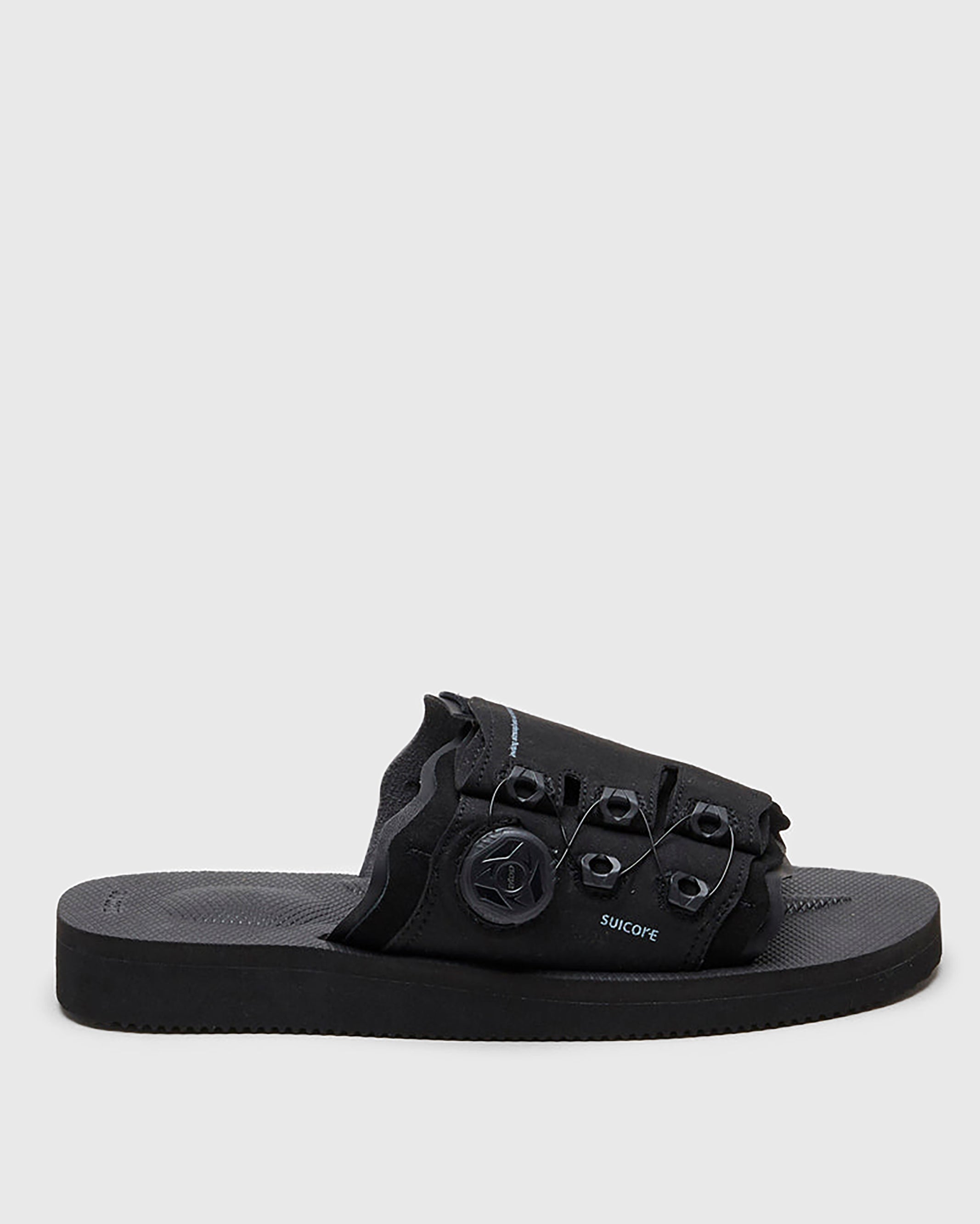 SUICOKE LETA-ab slides with black PU suede upper, black midsole and sole, laces and logo patch. From Spring/Summer 2022 collection on SUICOKE Official US & Canada Webstore.