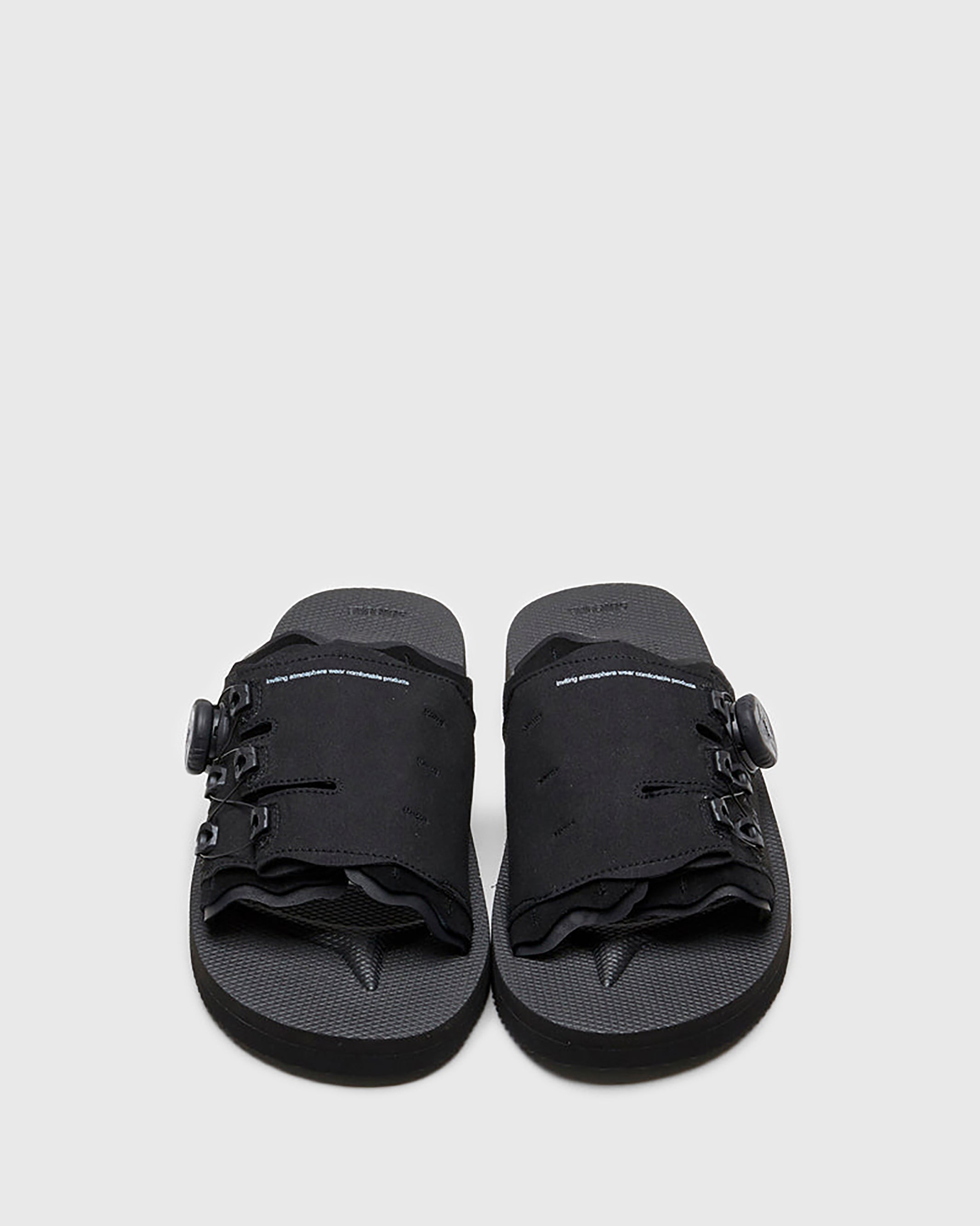 SUICOKE LETA-ab slides with black PU suede upper, black midsole and sole, laces and logo patch. From Spring/Summer 2022 collection on SUICOKE Official US & Canada Webstore.