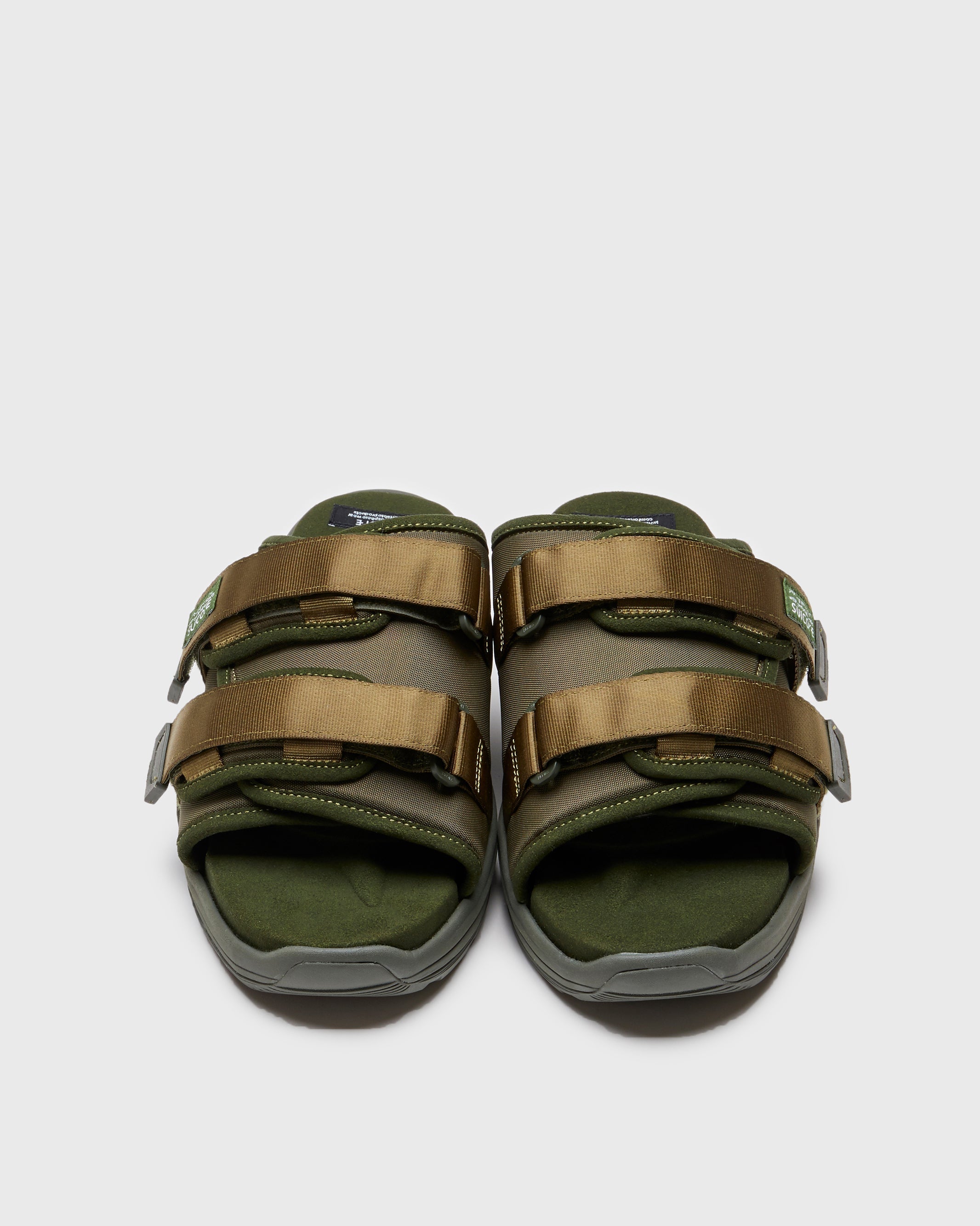 SUICOKE MOTO-Run slides with olive nylon upper, olive midsole and sole, strap and logo patch. From Spring/Summer 2023 collection on SUICOKE Official US & Canada Webstore. OG-332 OLIVE.