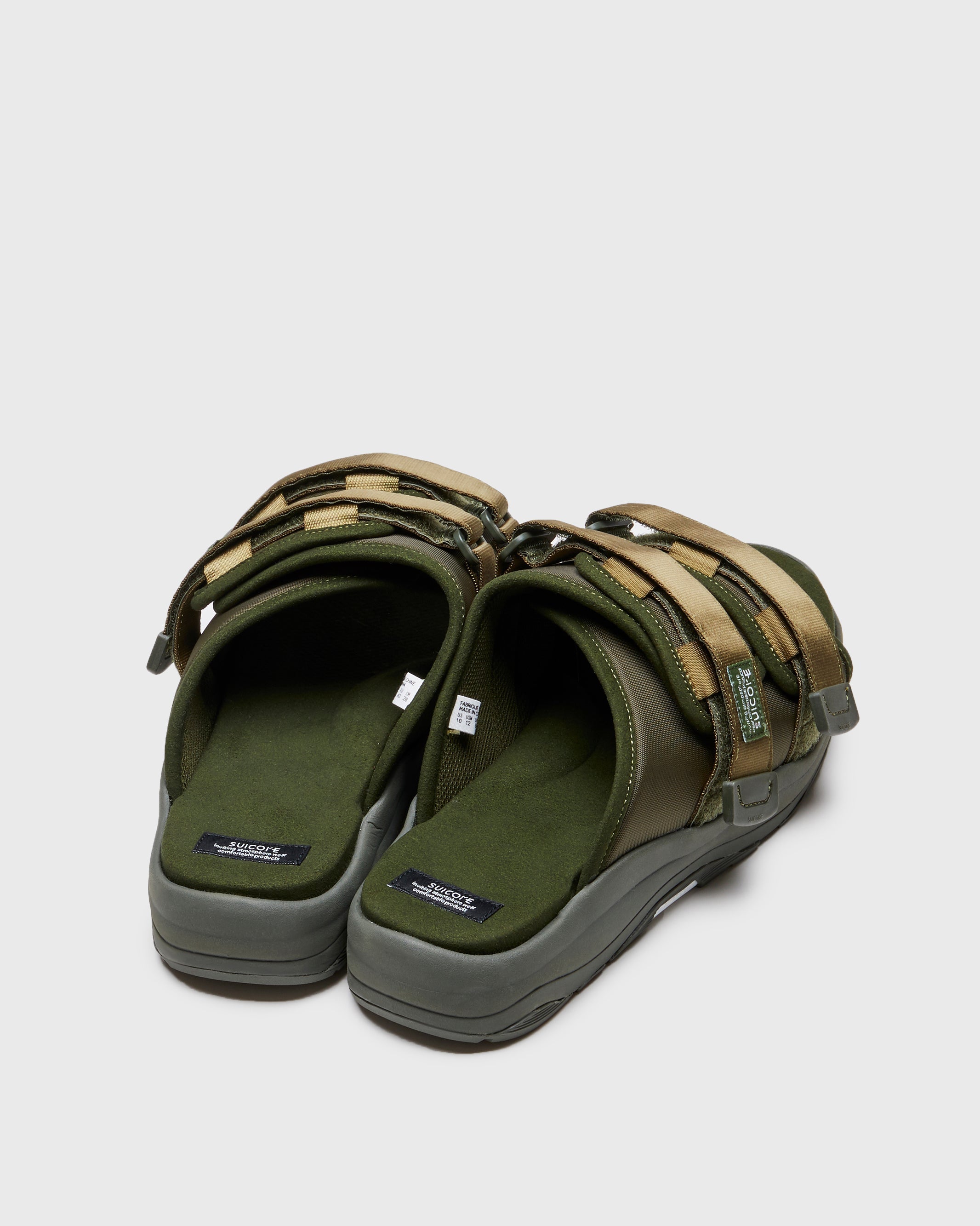 SUICOKE MOTO-Run slides with olive nylon upper, olive midsole and sole, strap and logo patch. From Spring/Summer 2023 collection on SUICOKE Official US & Canada Webstore. OG-332 OLIVE.